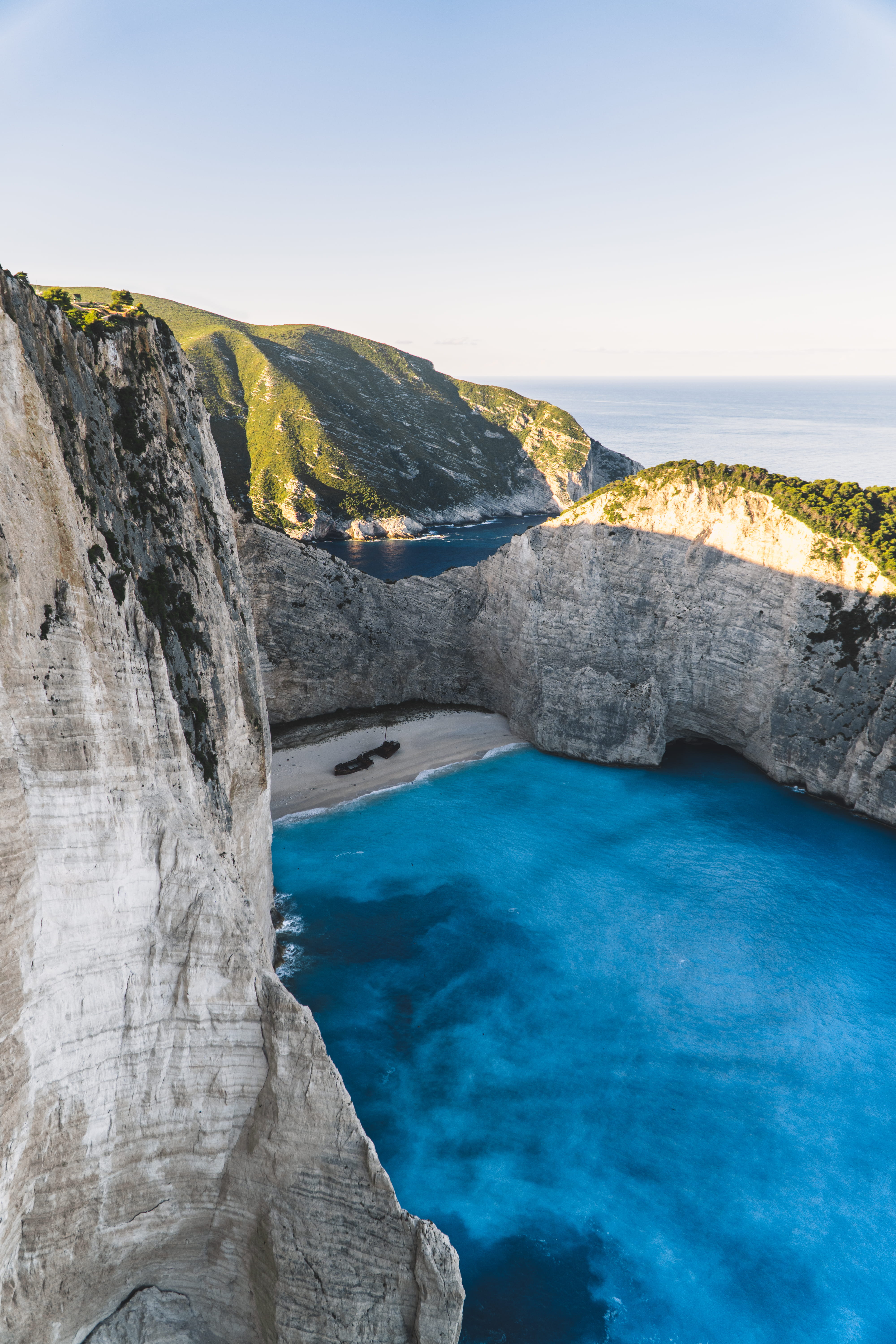 water, rock - Object, bay Of Water, no people, beach, seascape, famous Place, aerial, body, vacations, sea, tourism, island, body of water, nature, summer, Phone HD Wallpaper