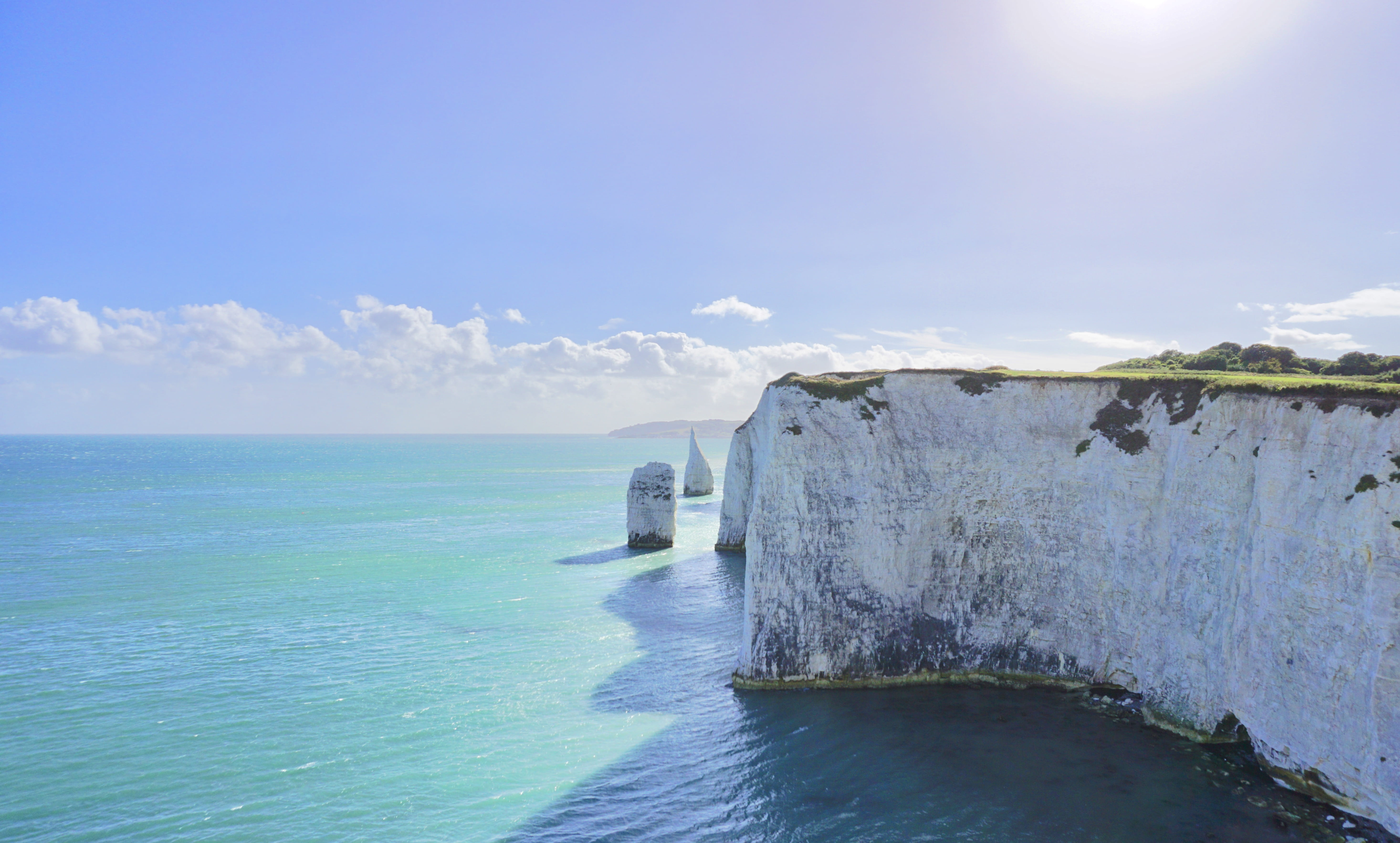 cliff, water, scenery, snow, tranquil scene, non-urban scene, promontory, uk, cloud - sky, ice, land, beauty in nature, 5K, blue, horizon, ocean, idyllic, HD Wallpaper