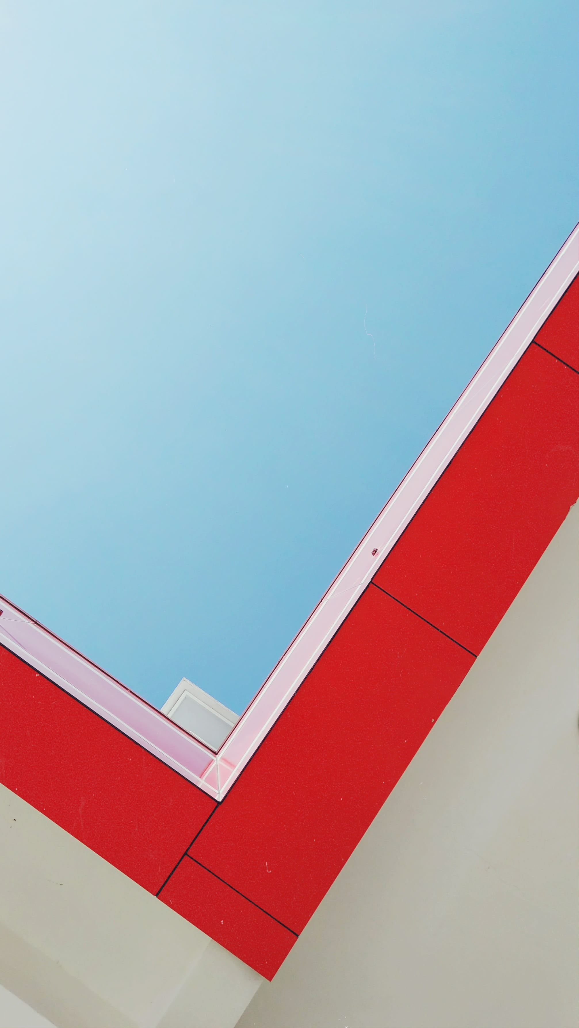 low angle view, handrail, office building, dome, alphabet, blue, skylight, red, shape, wall - building feature, building, triangle, outdoors, clear sky, Phone HD Wallpaper