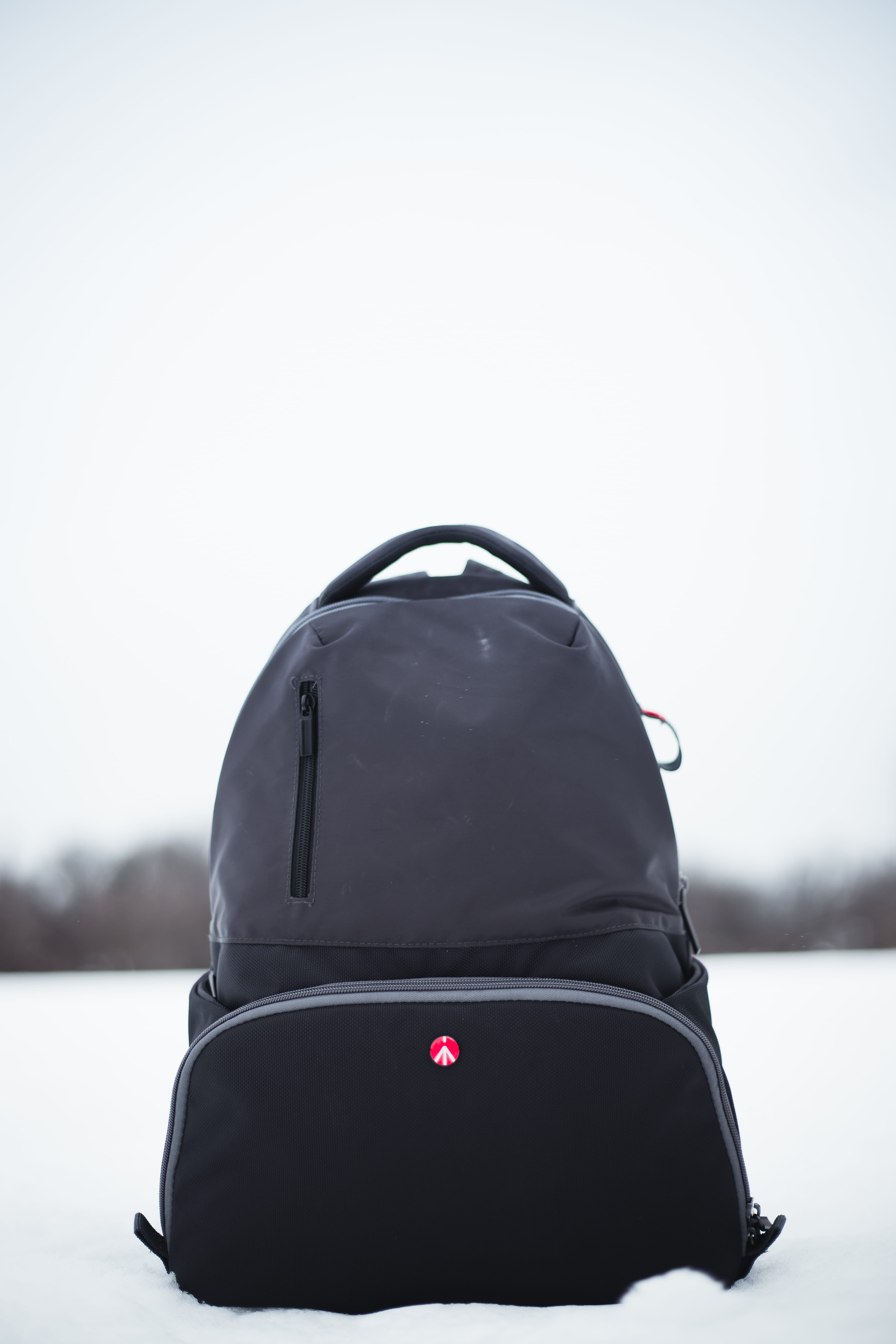 backpack, protection, winter, black color, white, security, manfrotto, 5K, clear sky, safety, sky, camera bag, close-up, day, snow, no people, bag, focus on foreground, Phone HD Wallpaper