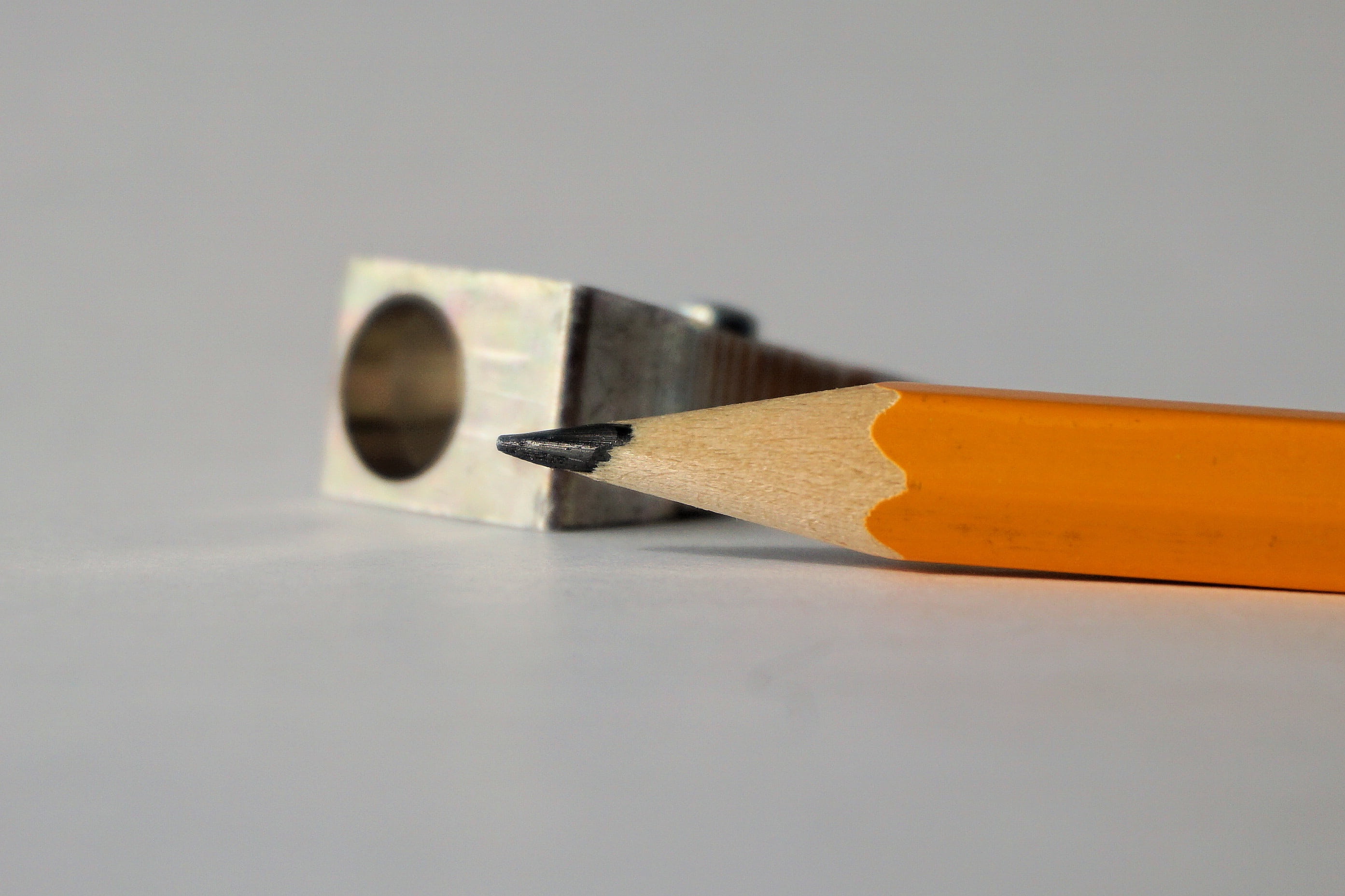 orange, indoors, 2K, art and craft, pencil, close, writing implement, gray background, leave, education, studio shot, writing instrument, wood - material, HD Wallpaper