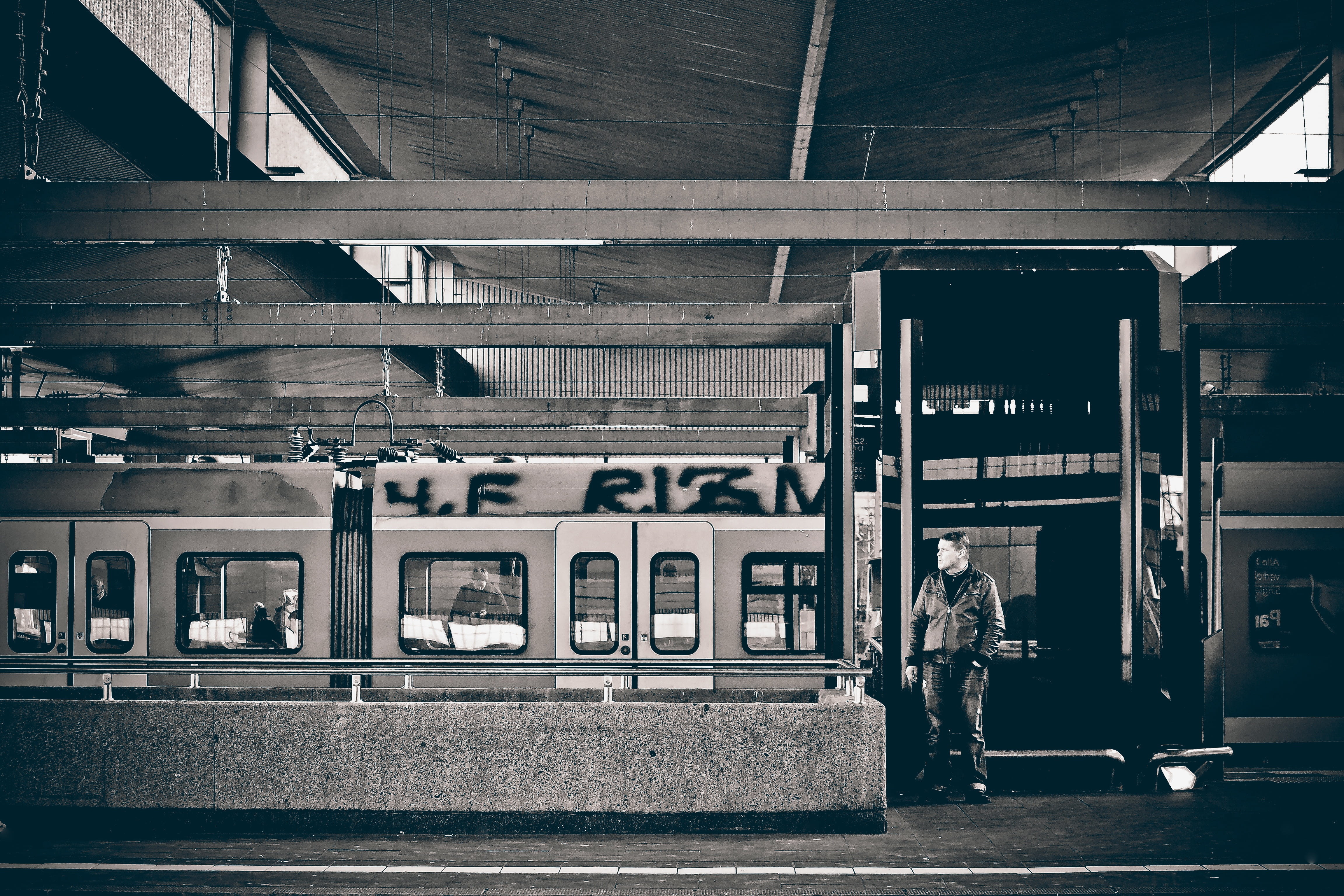 one person, train - vehicle, rail traffic, waiting, grayscale, railway station, connection, lifestyles, front, street photography, public means of transport, HD Wallpaper