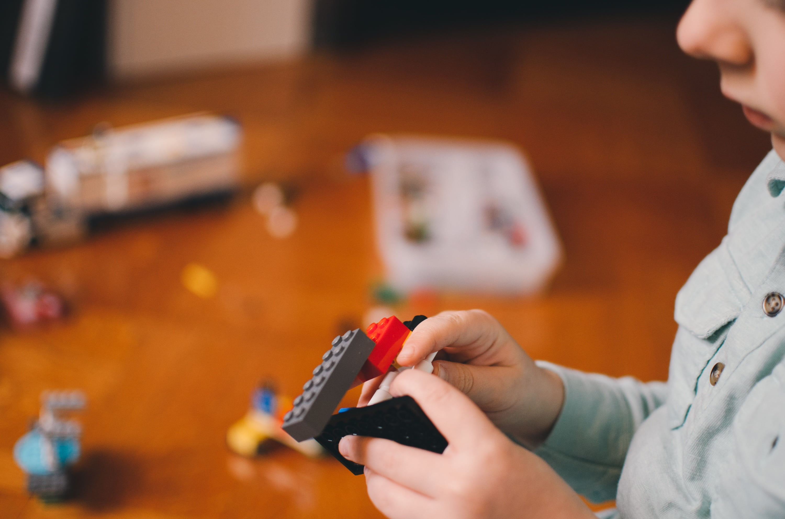 blocks, women, selective focus, photography, indoors, toy, only women, child, human hand, headshot, focus on foreground, side view, people, close-up, wireless technology, HD Wallpaper