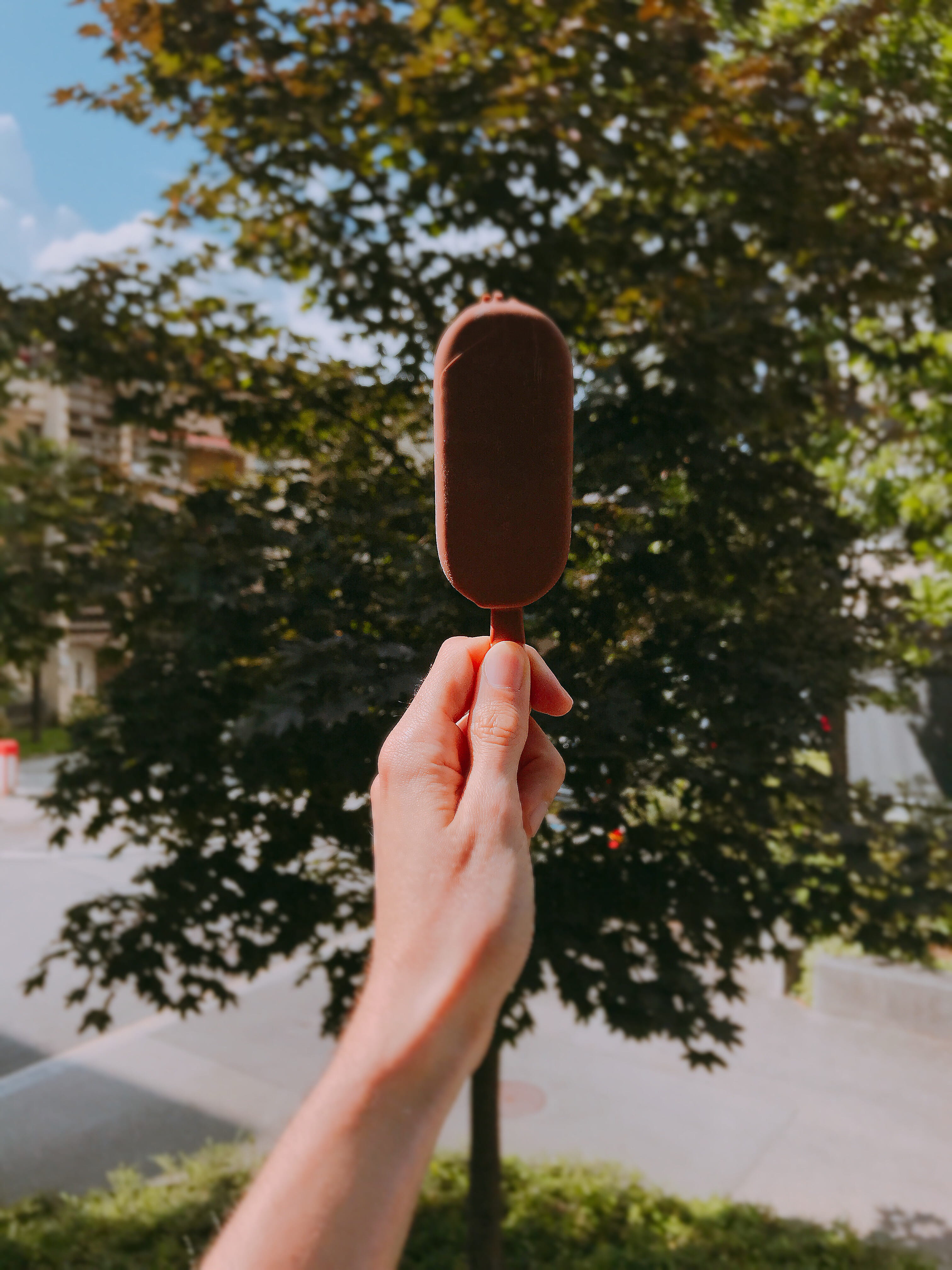 food, 4K, popsicle, body part, day, leisure activity, one person, tree, chocolate, temptation, lifestyles, outdoors, person, personal perspective, summer, Phone HD Wallpaper