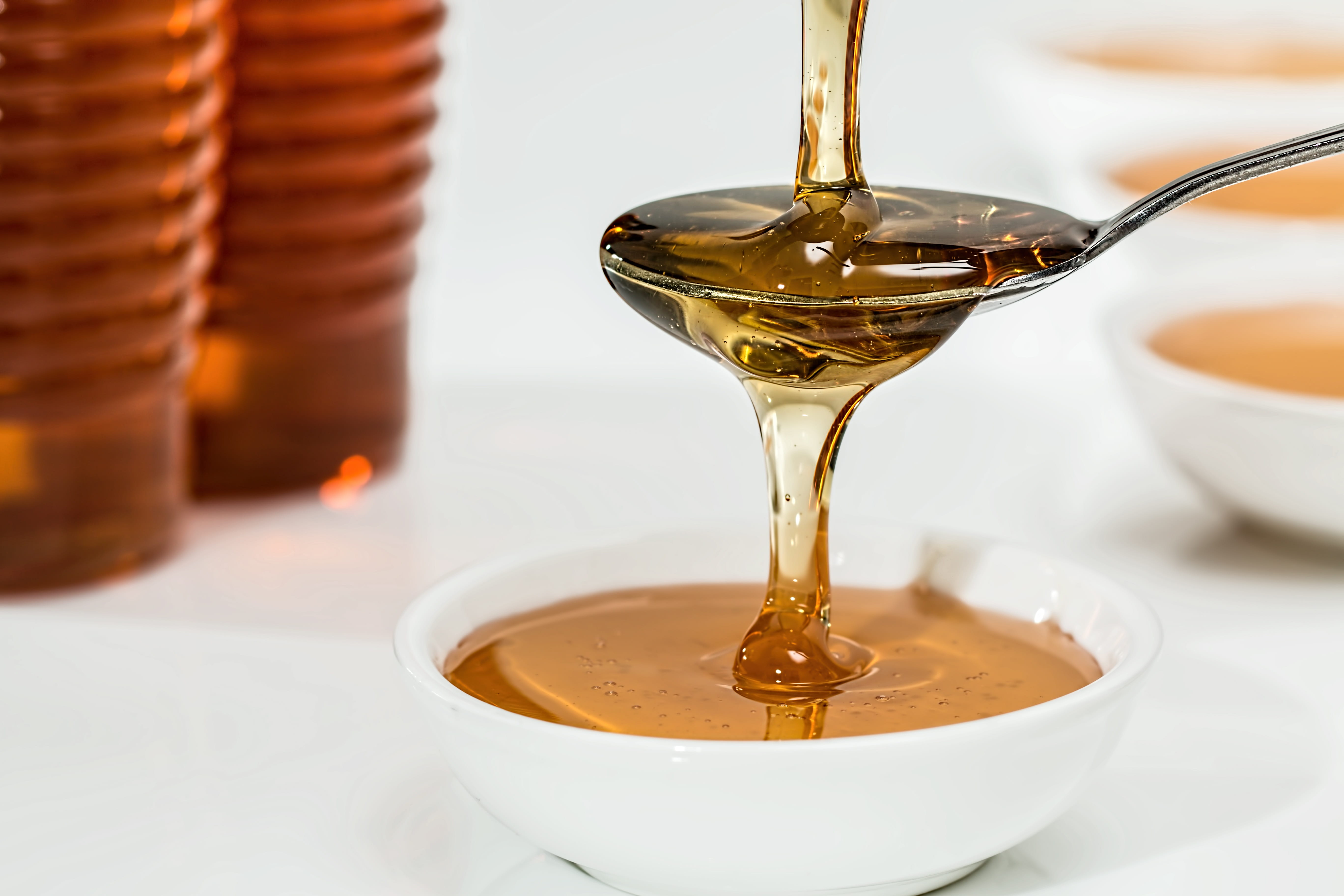 household equipment, kitchen utensil, filled, indoors, honey, food, crockery, teaspoon, carbohydrate, gold, glass, white, yellow, alcohol, liquid, translucent, HD Wallpaper