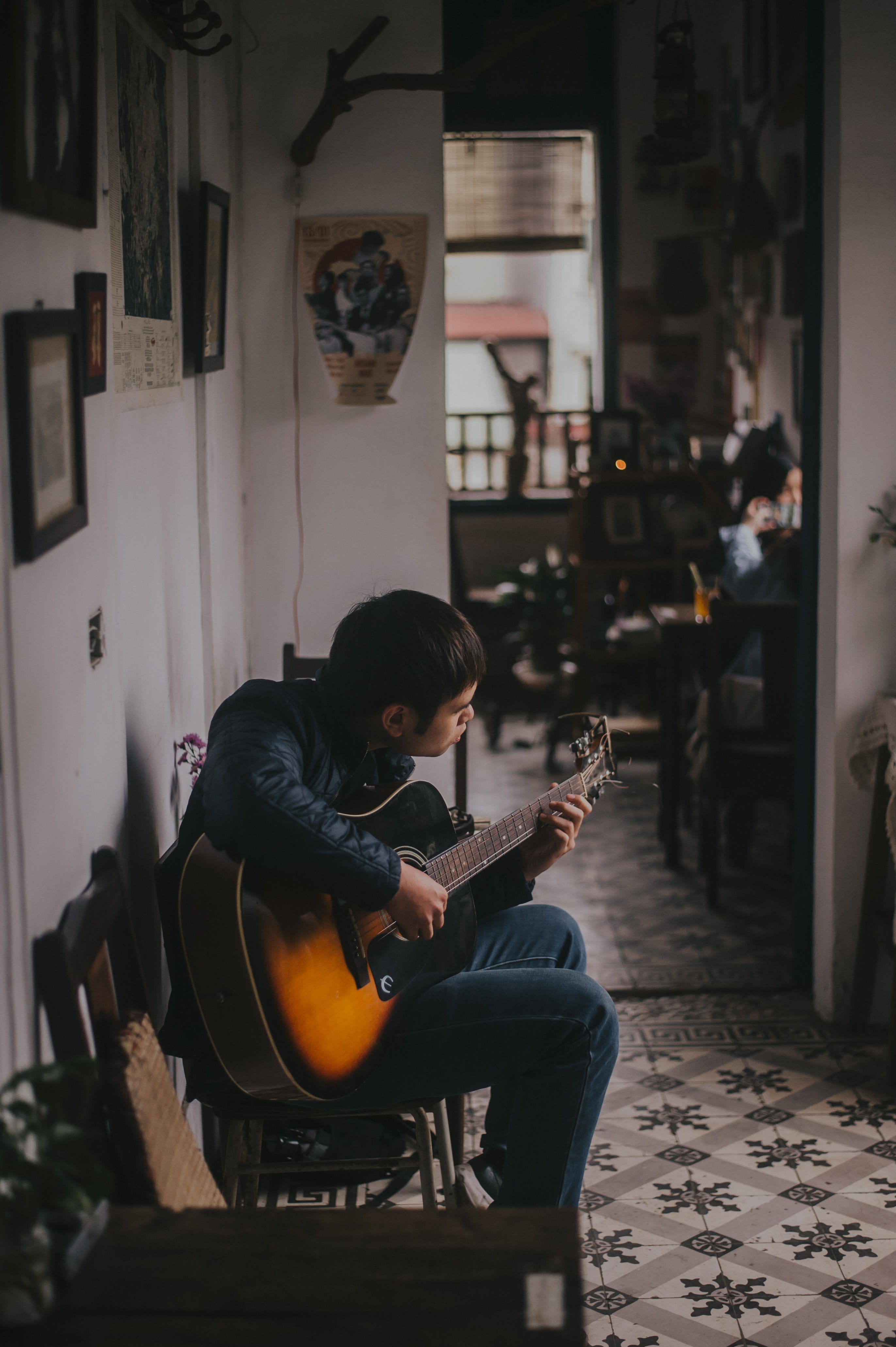 entertainment, full length, leisure activity, person, domestic room, lifestyles, man, one person, hairstyle, electric guitar, band, casual clothing, furniture, Phone HD Wallpaper