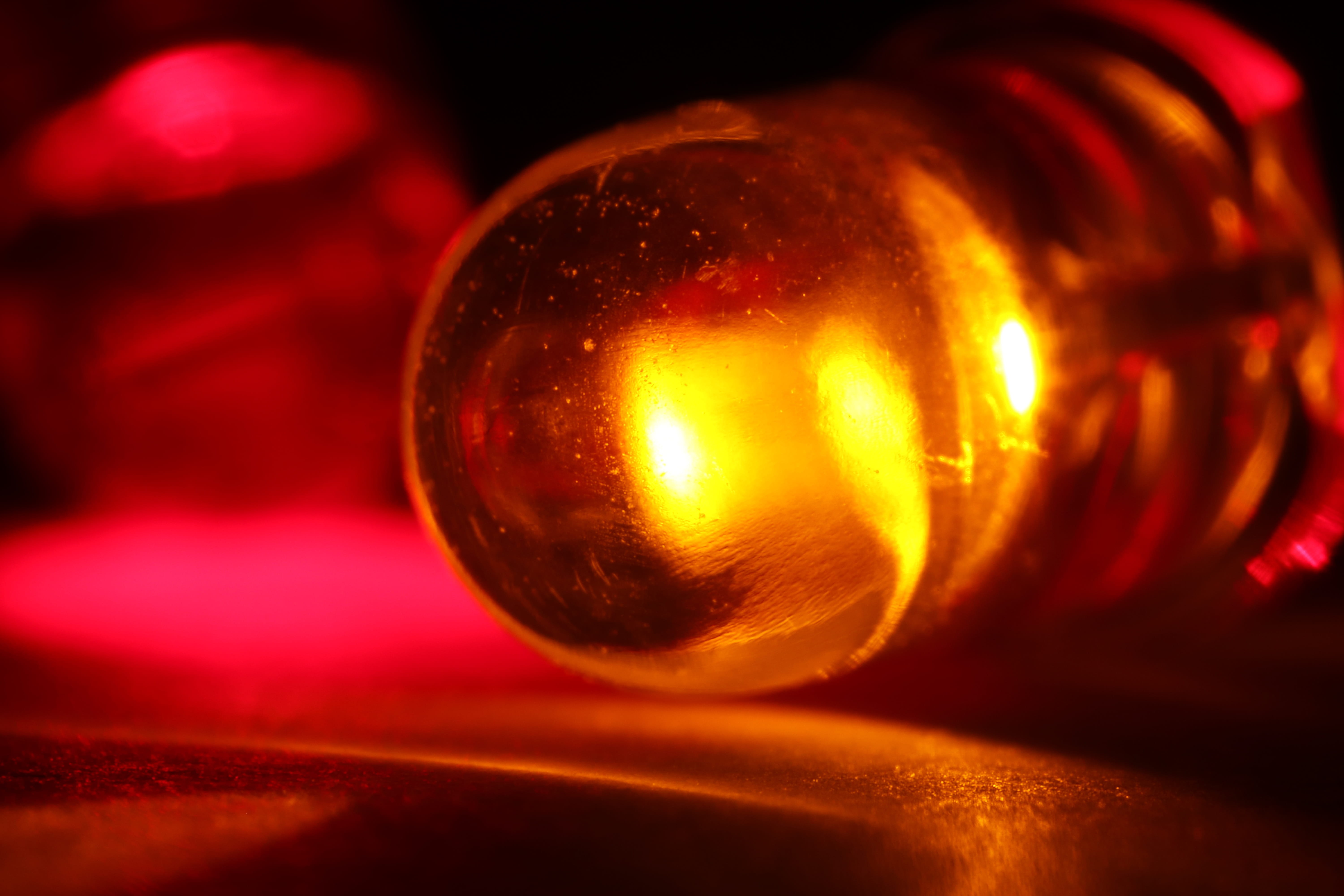 led light, sphere, illuminated, black background, lamp, selective focus, light, reflection, indoors, hell, no people, 5K, golden, lighting equipment, dark, HD Wallpaper