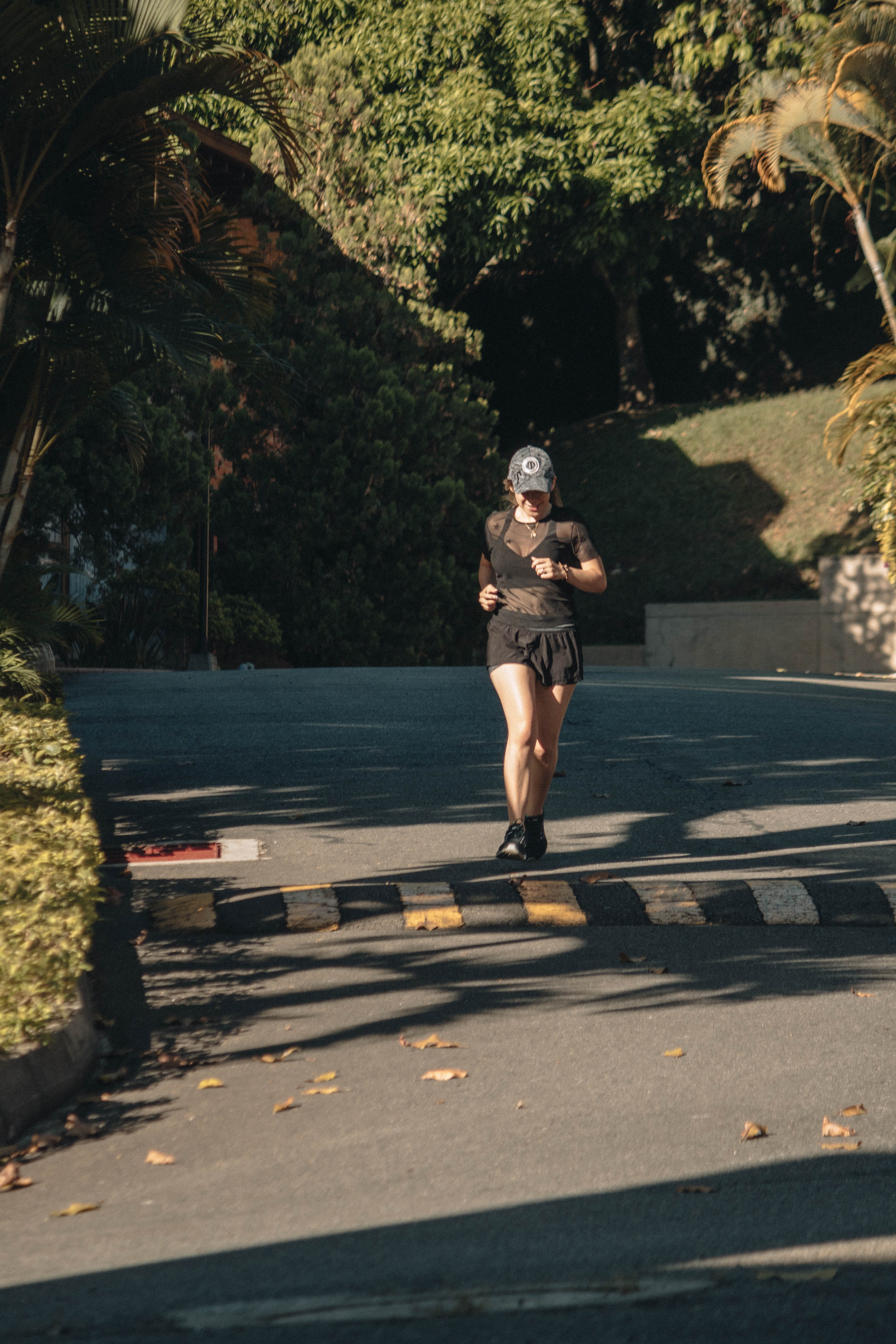 helmet, shorts, 5K, gym, exercise, slope, working out, human, real people, casual clothing, walking, one person, plant, park, sports, shadow, full length, Phone HD Wallpaper