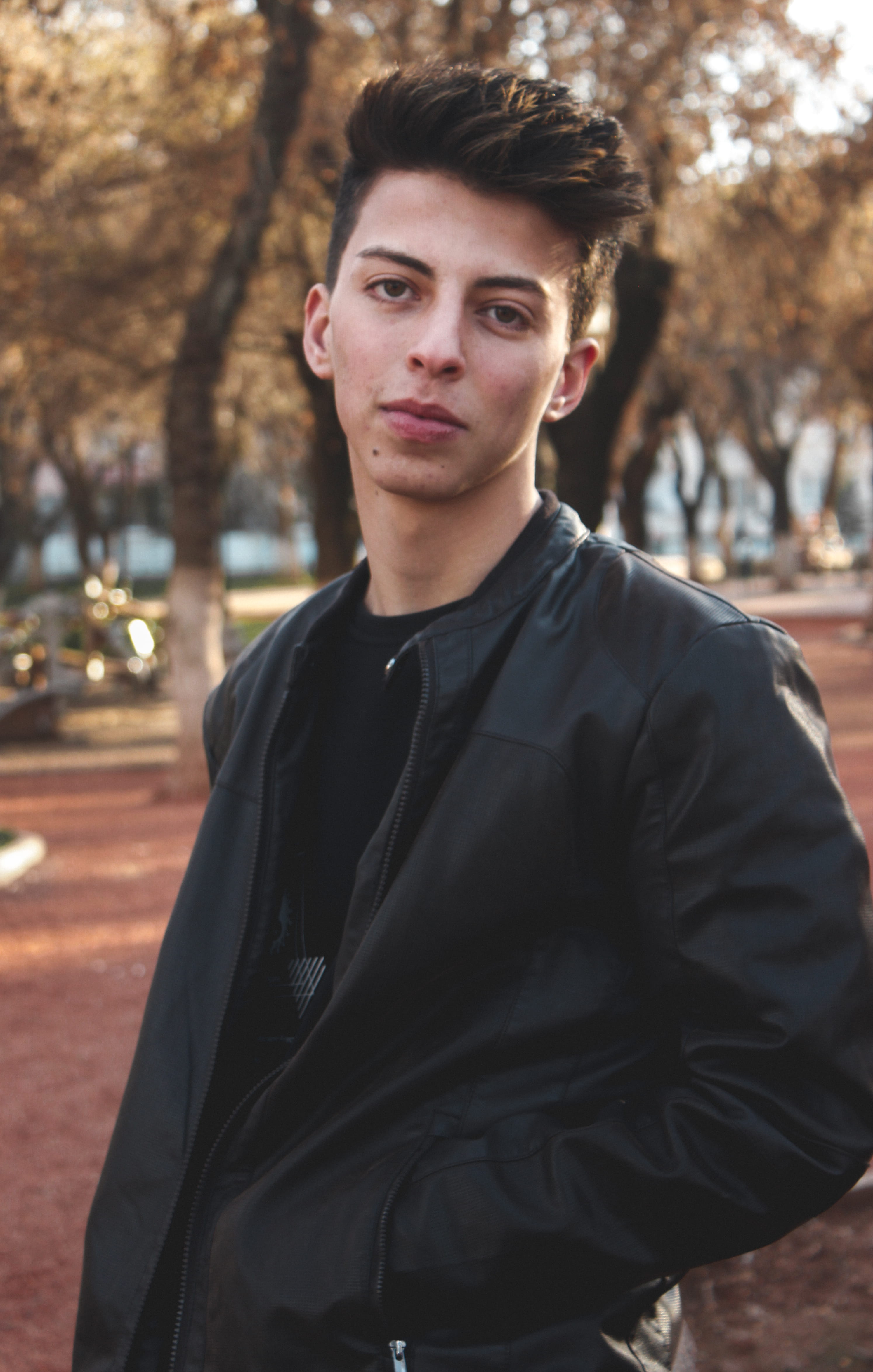 looking, portrait, facial expression, one person, jacket, black, shirt, model, confidence, casual clothing, guy, young men, adult, day, waist up, handsome, Phone HD Wallpaper