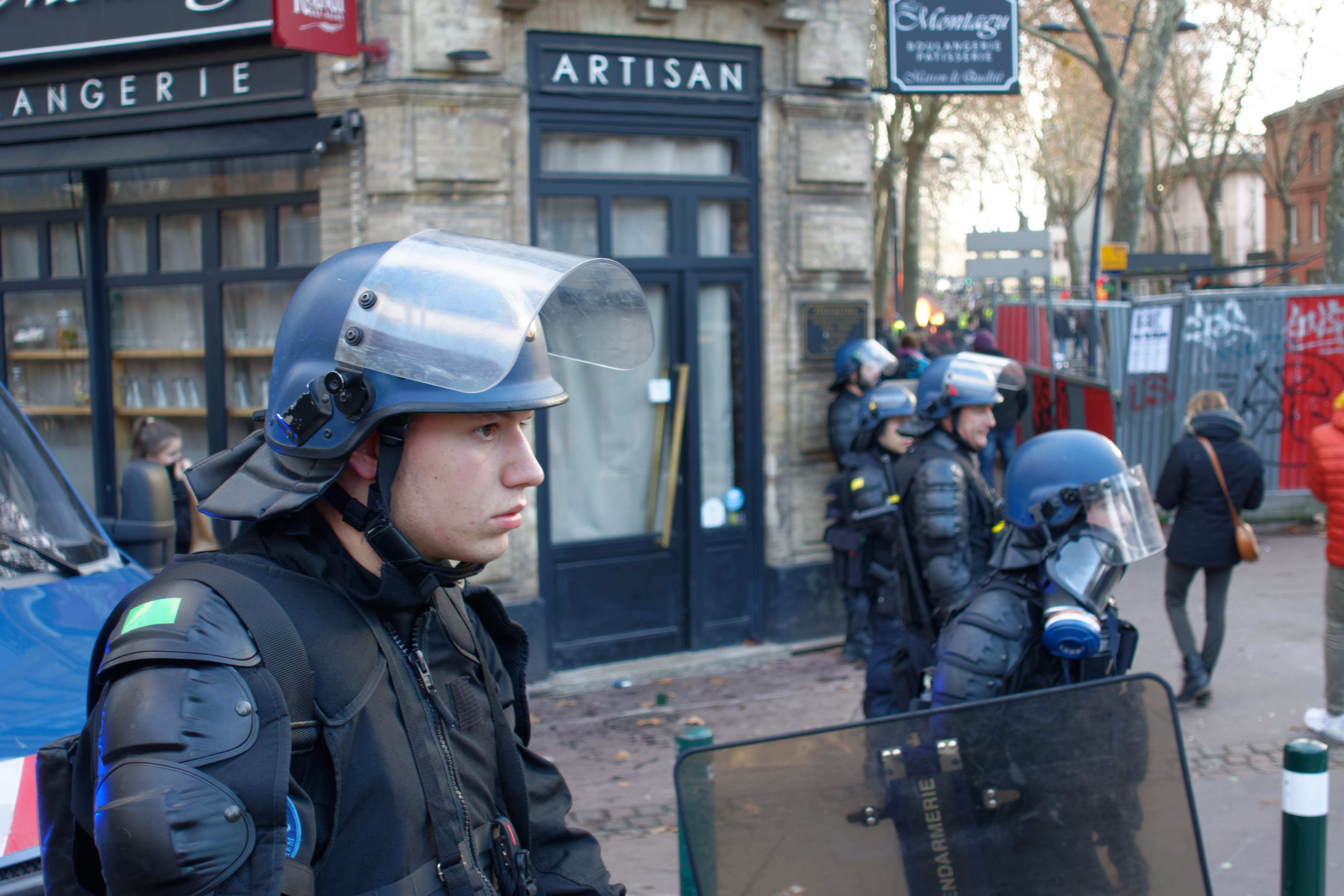 day, uniform, headwear, macron, helmet, young men, architecture, government, gilets jaune, headshot, group of people, riot, security, city, standing, wearing, HD Wallpaper