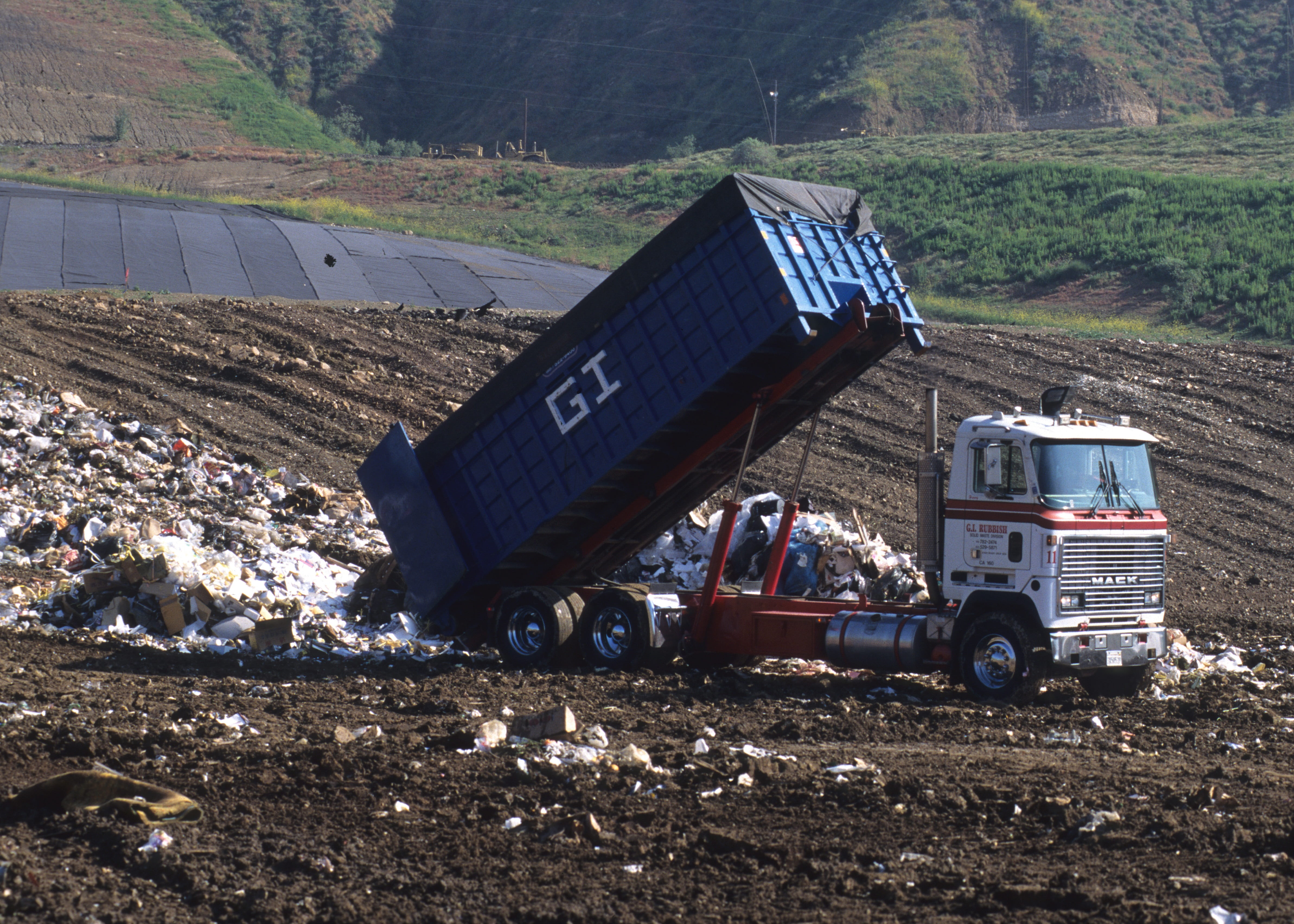 land vehicle, road, field, landscape, daytime, truck, Dump Truck, mode of transportation, mountain, no people, Disposal, white, transportation, pollution, HD Wallpaper