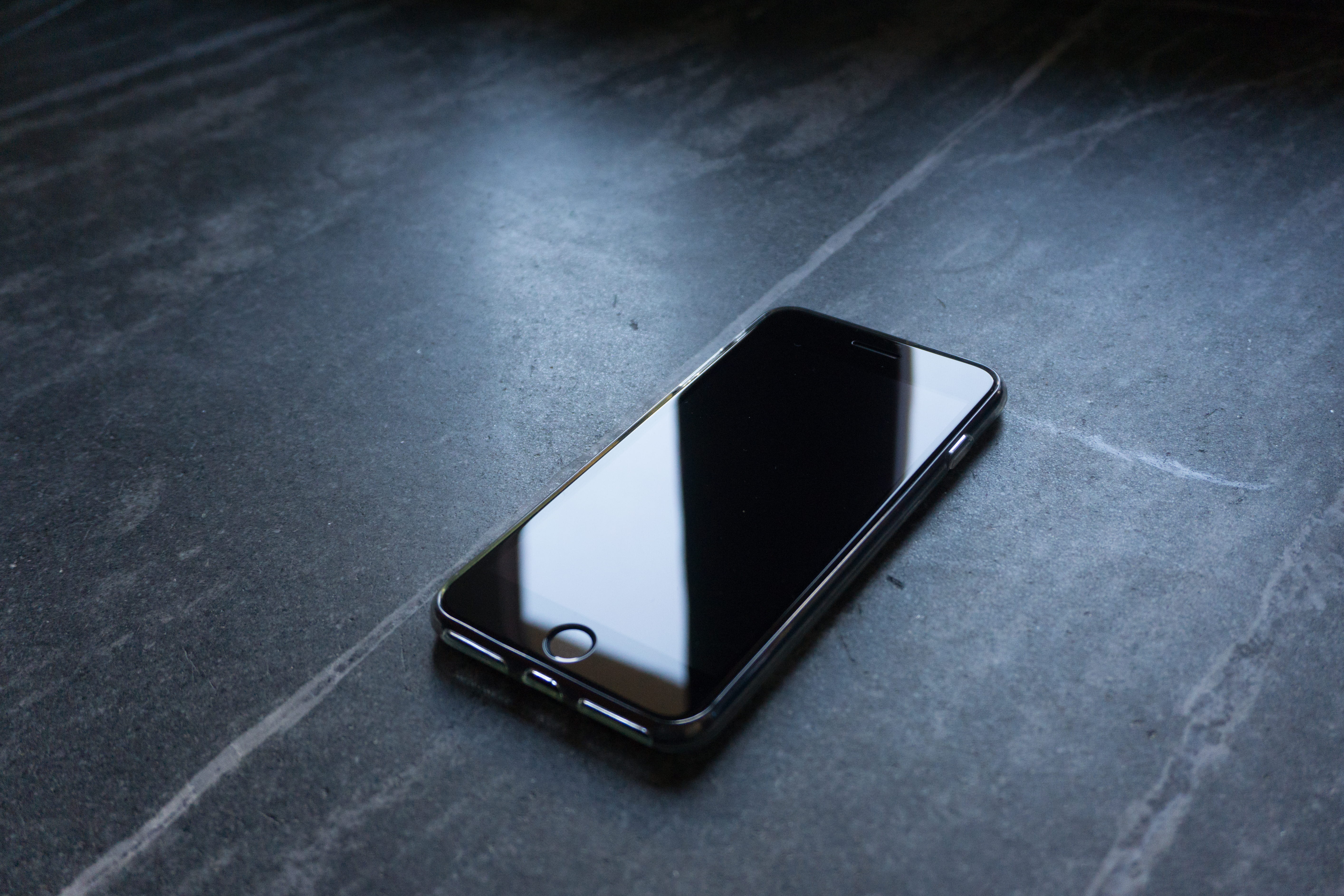 dark, high angle view, copy space, turned, table, mobile phone, surface, black color, phone, simplicity, iphone, smart phone, gray, portable information device, HD Wallpaper
