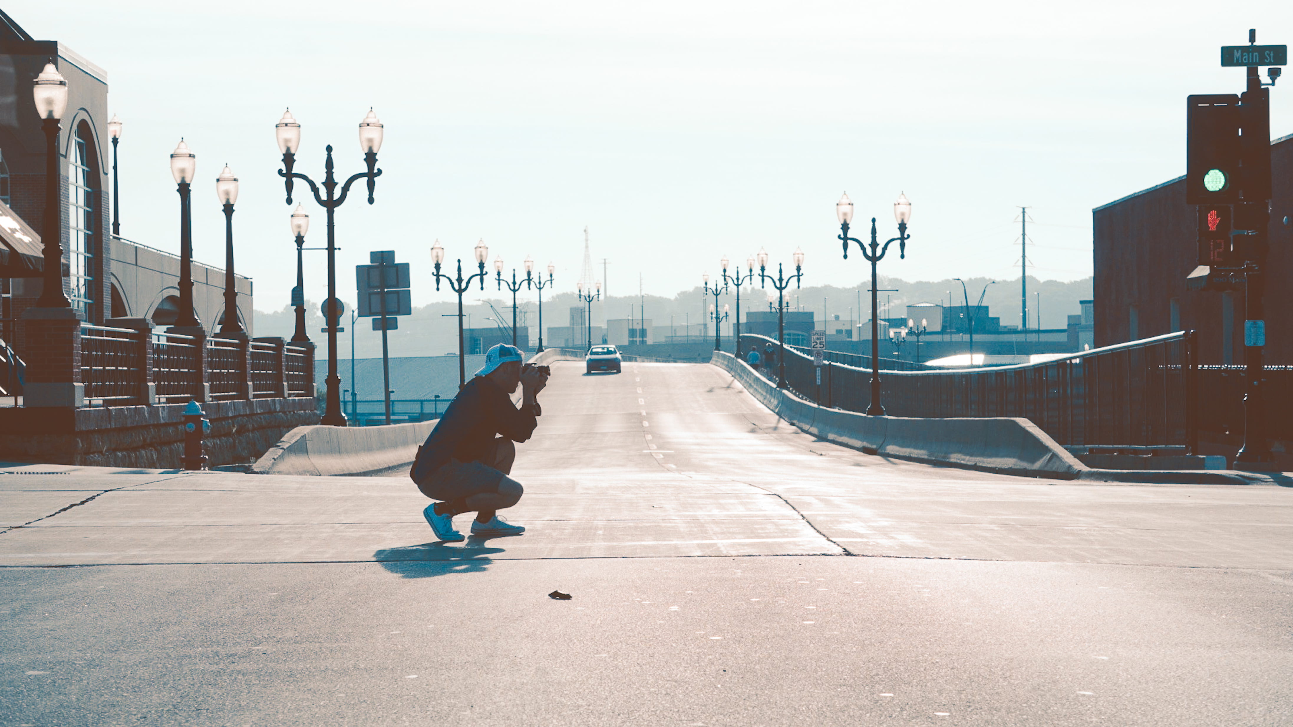built structure, vertebrate, person, man, full length, dubuque, technology, sidewalk, architecture, photographer, one animal, crouched, city, lifestyles, HD Wallpaper