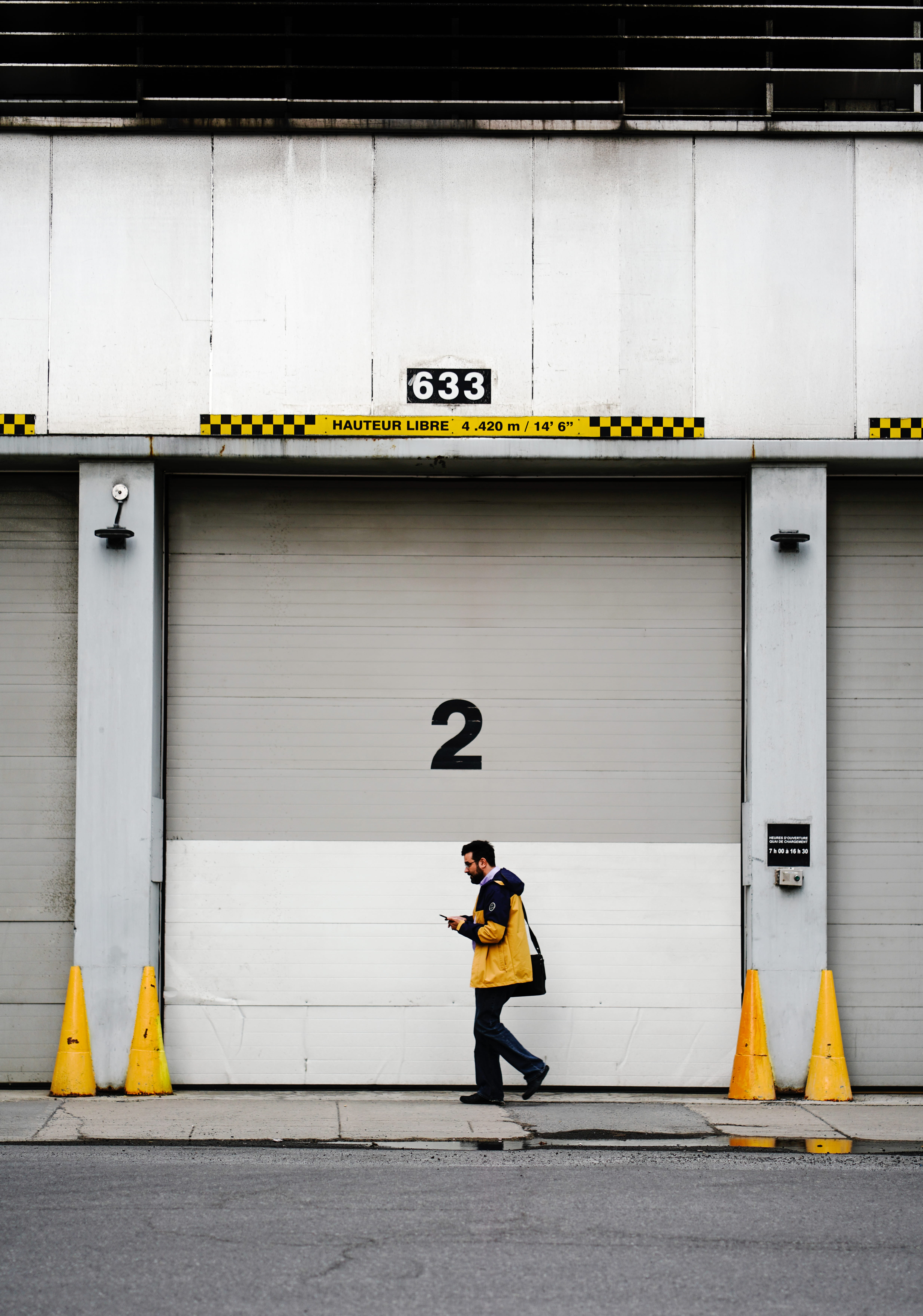 geometry, full length, hoodie, one person, airport terminal, transportation, real people, concrete, day, black, male, number, built structure, jacket, wall - building feature, Phone HD Wallpaper