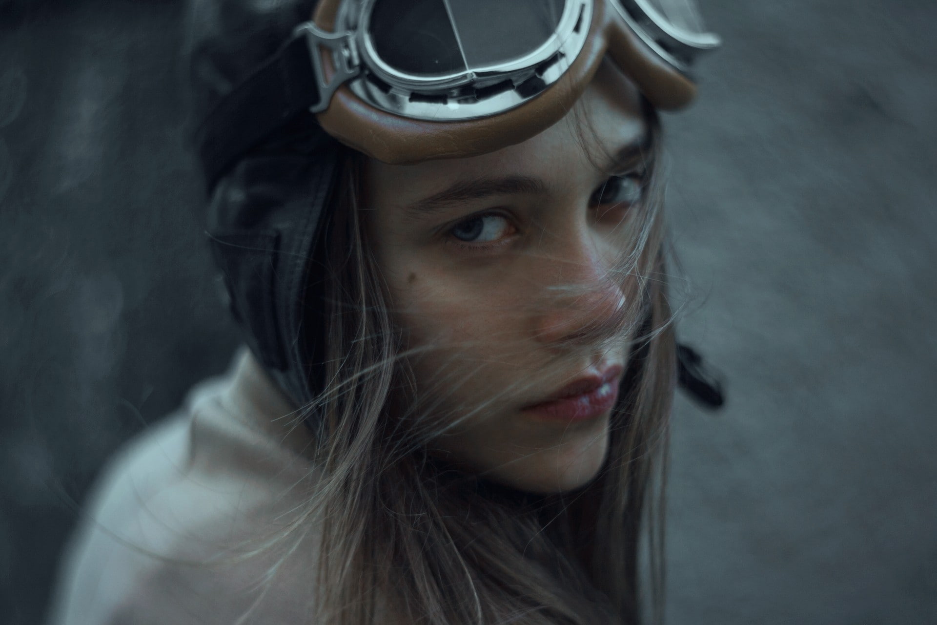 pilot, women, brunette, hat, blue eyes, model, red lipstick, 1080P, hair in face, goggles, looking at viewer, women with glasses, face, portrait, HD Wallpaper