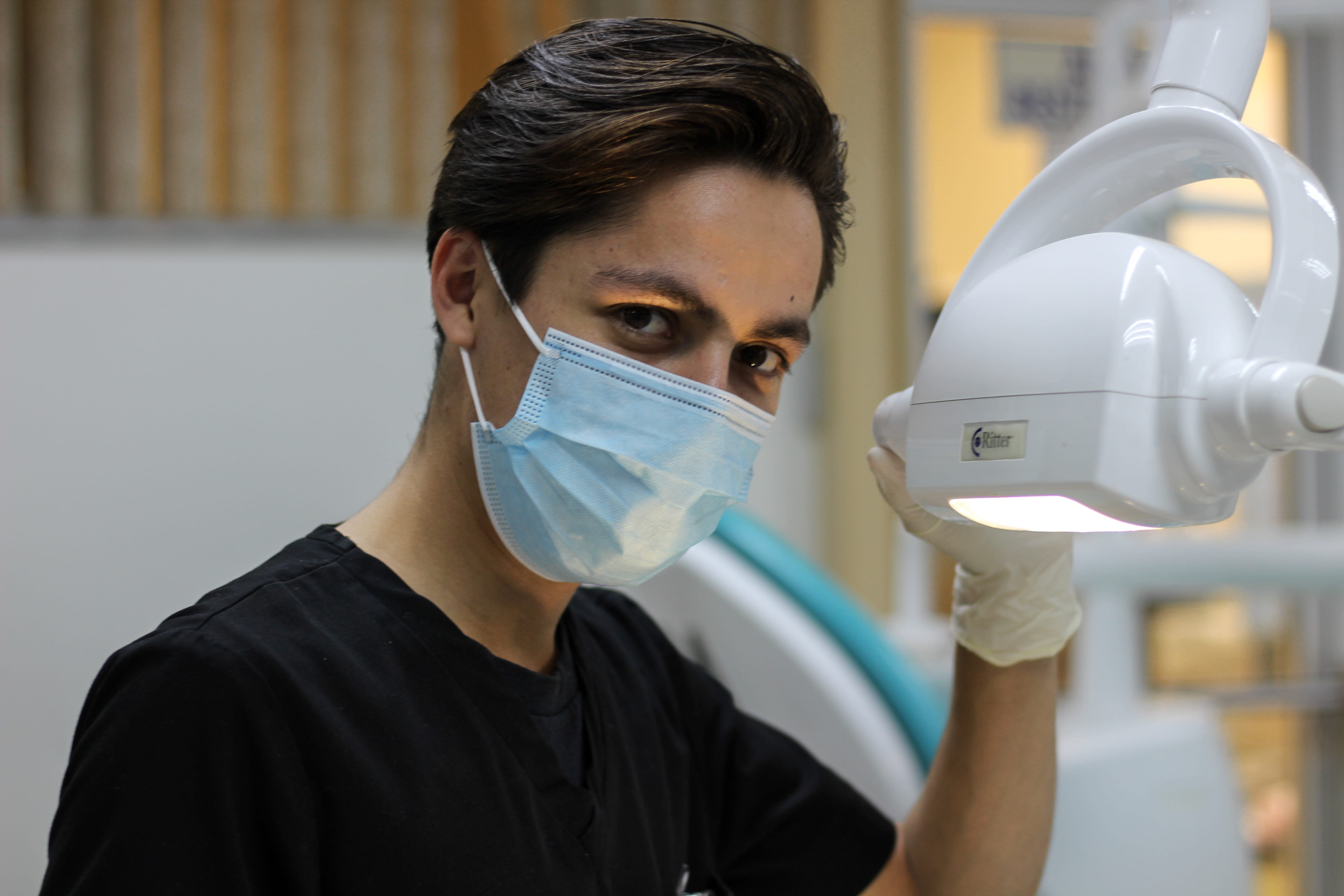 front view, focus on foreground, holding, surgical mask, security, mask, lab coat, men, healthcare and medicine, portrait, 5K, glass, expertise, protective workwear, HD Wallpaper