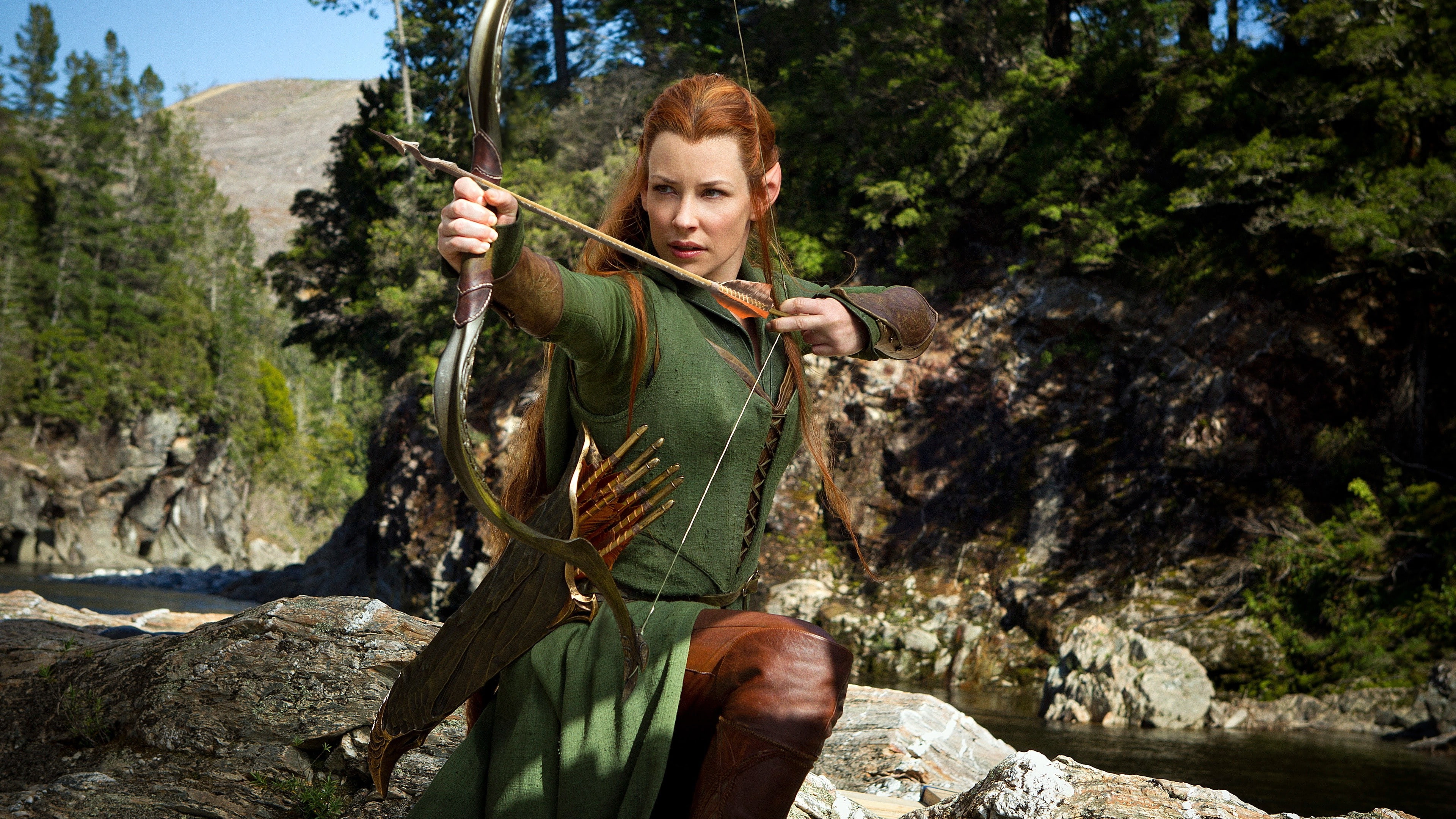 holding, arrow - bow and arrow, young adult, tree, rock - object, forest, day, Tauriel, young women, outdoors, Evangeline Lilly, river, one person, plant, HD Wallpaper