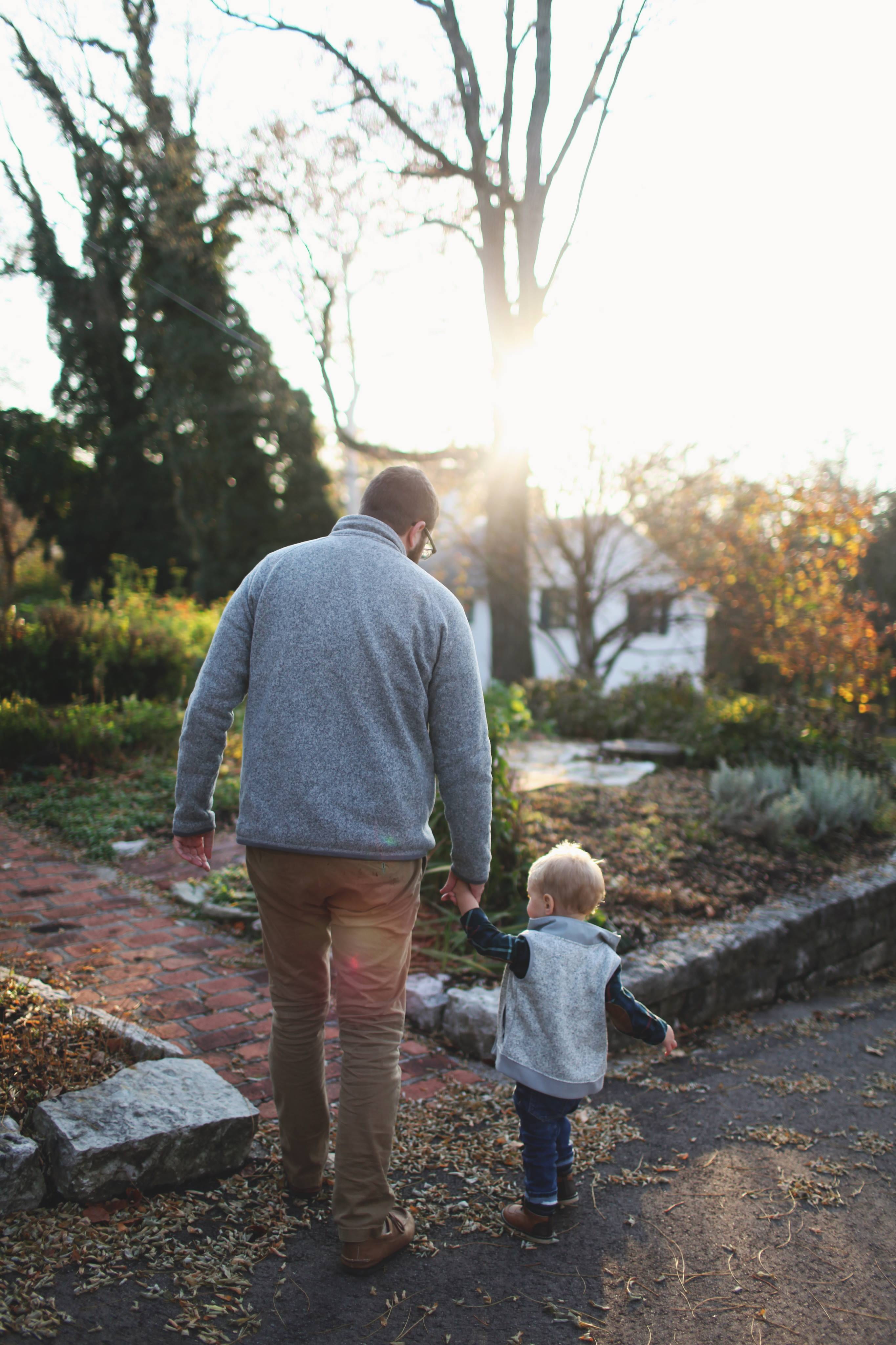 sun, kid, outdoors, child, tree, landscape, grass, boy, son, walking, bonding, dad, togetherness, baby, rear view, nature, facing, full length, father, Phone HD Wallpaper