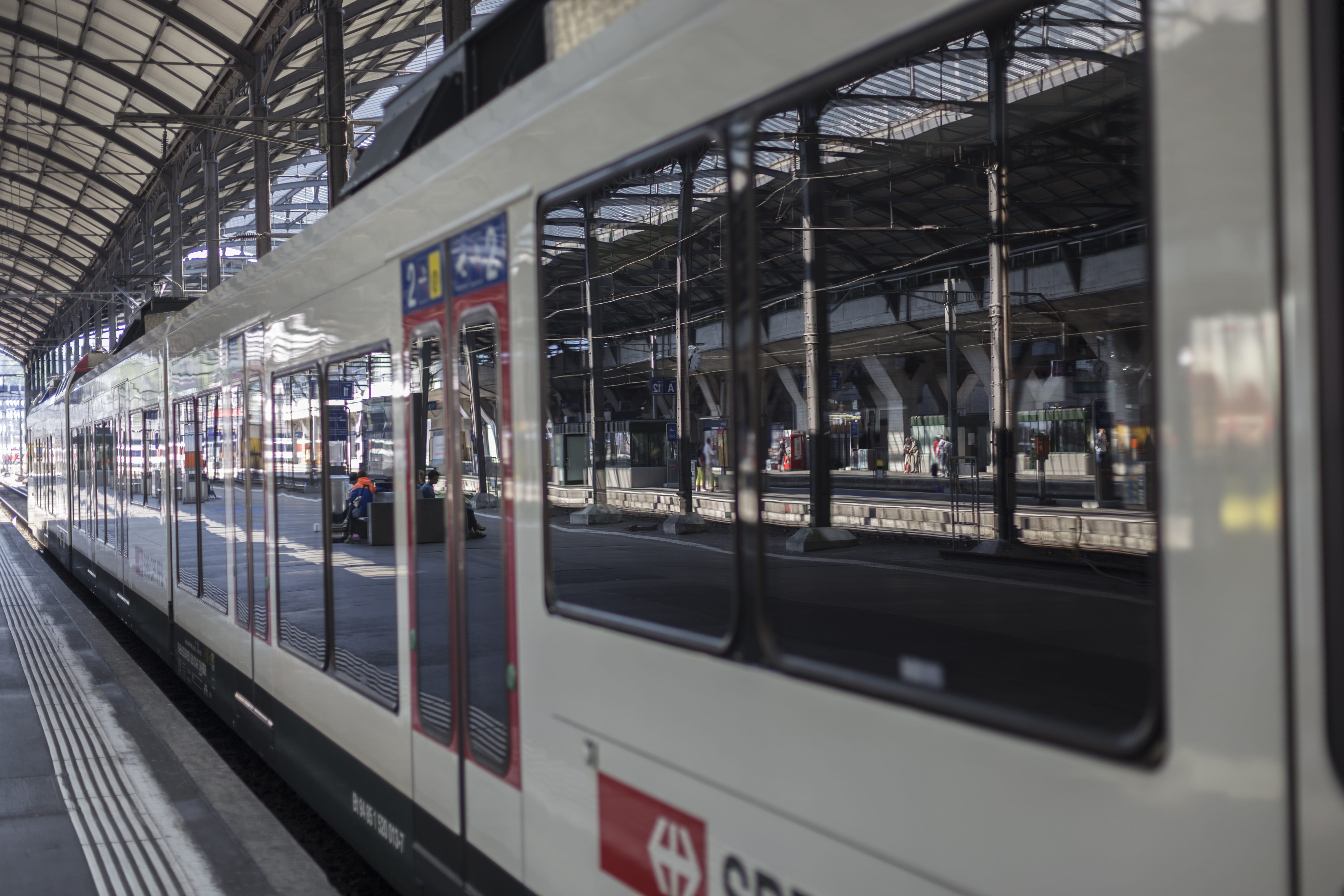 mode of transportation, railroad station, Reflections, railway station, track, subway train, built structure, land vehicle, window, swiss federal railways, HD Wallpaper