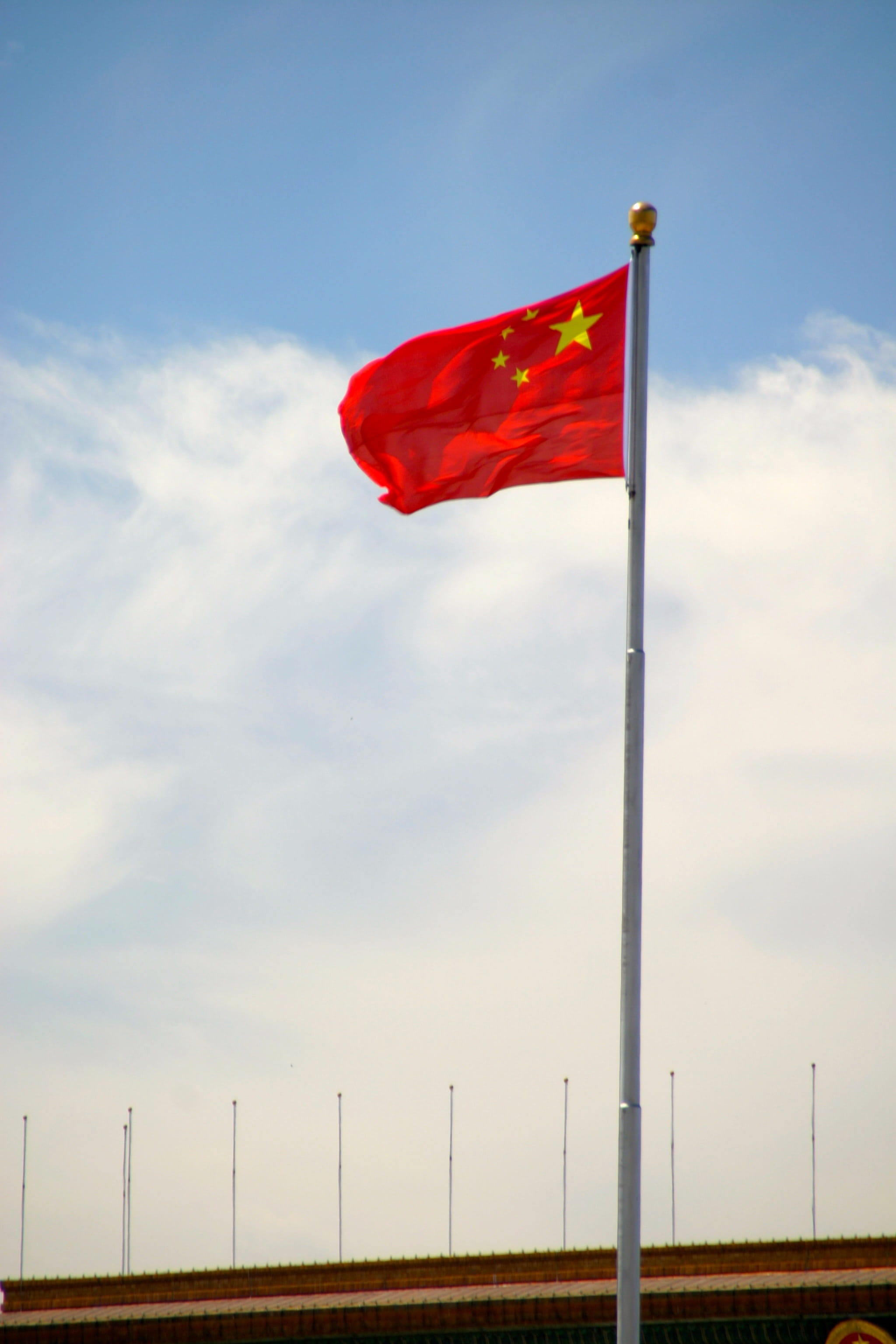 flags, sky, cloud - sky, outdoors, Flutter, 2K, wind, patriotism, fuel and power generation, pole, flag, no people, emotion, Flag, day, Red, beauty in nature, Phone HD Wallpaper