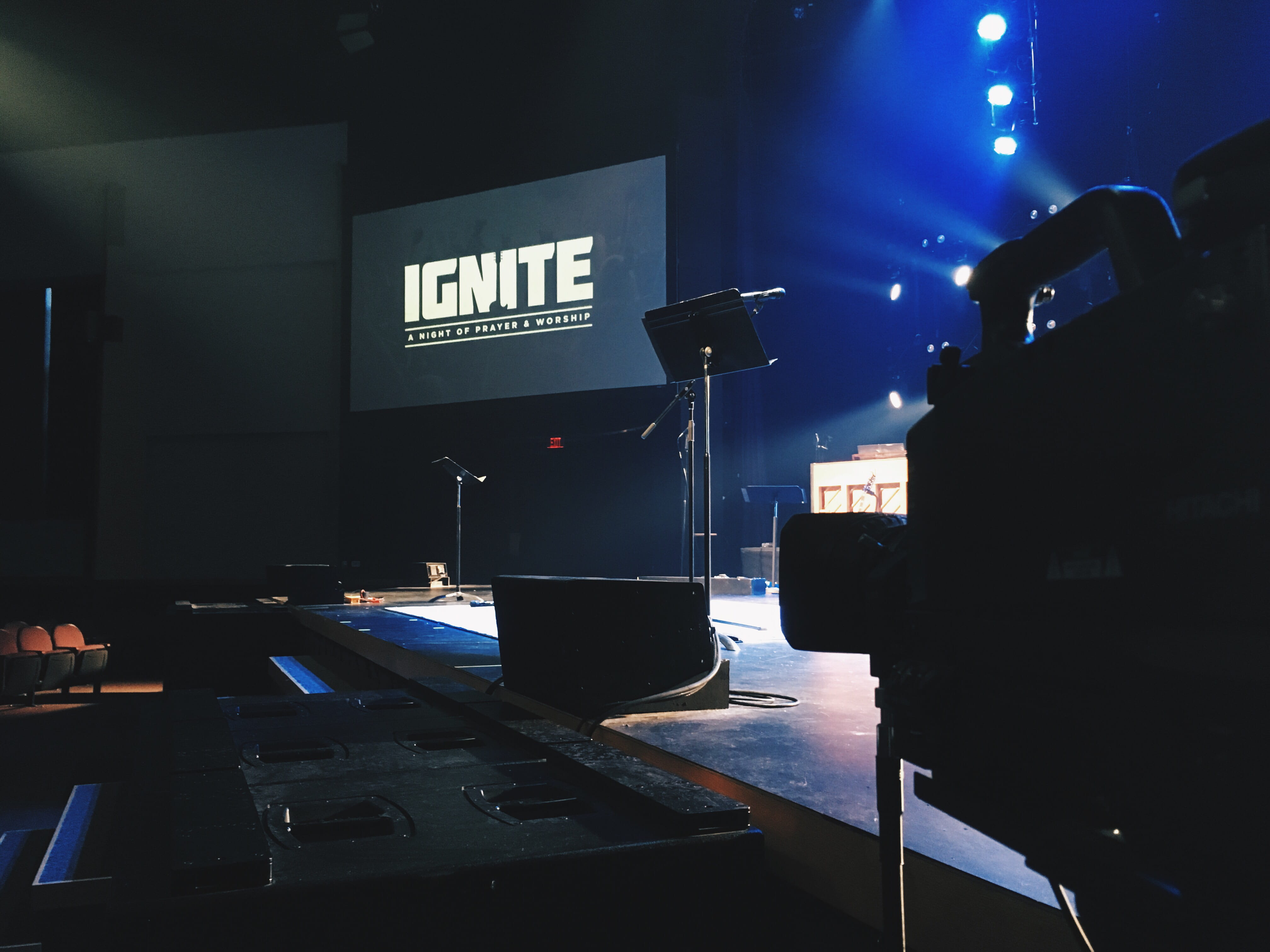 western script, city, car, stage, outdoors, live stream, rail transportation, nightlife, communication, transportation, motor vehicle, prayer, land vehicle, HD Wallpaper