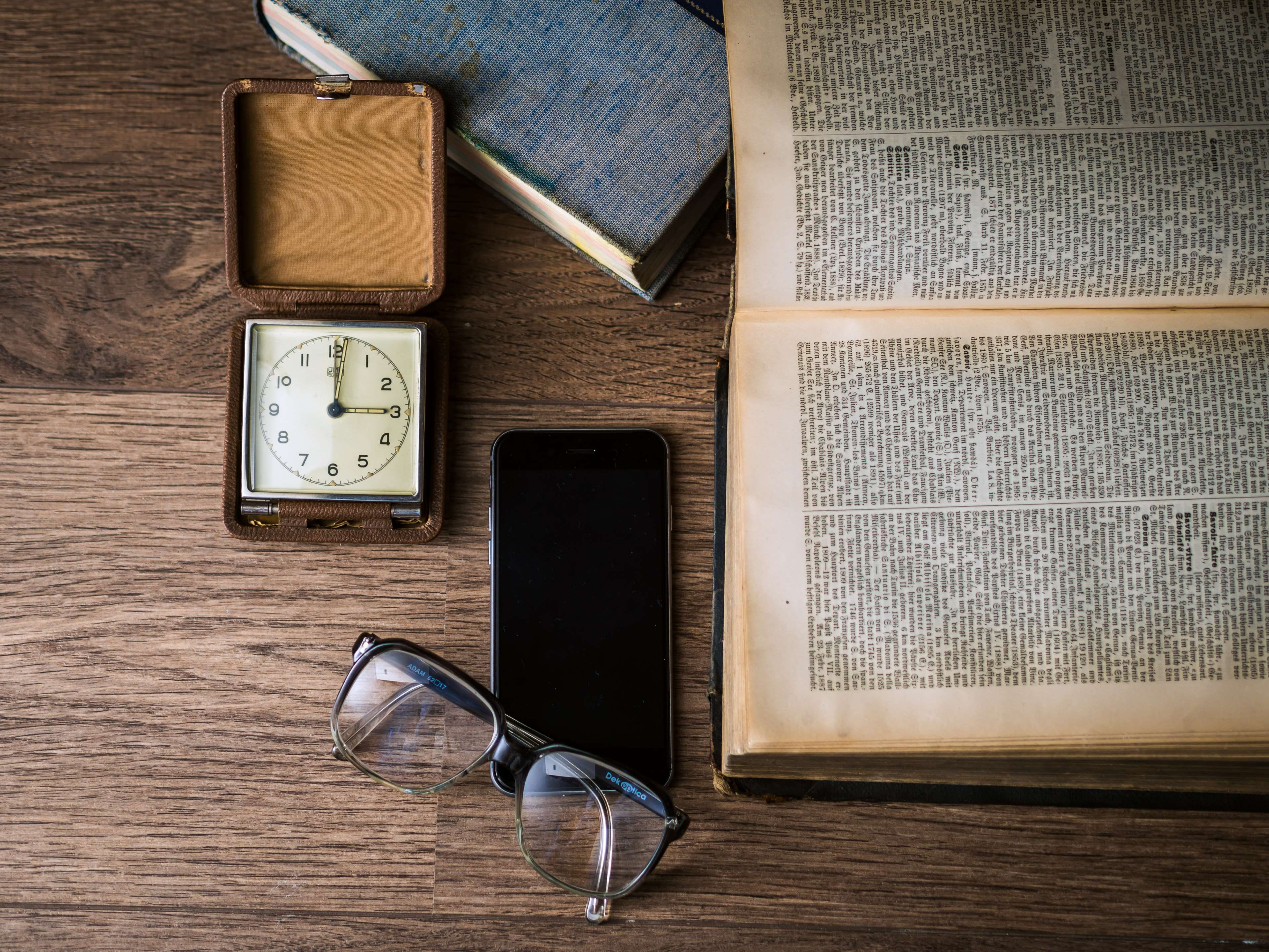 time, pages, no people, smartphone, communication, table, eyeglasses, book, connection, smart phone, still life, wood - material, portable information device, HD Wallpaper