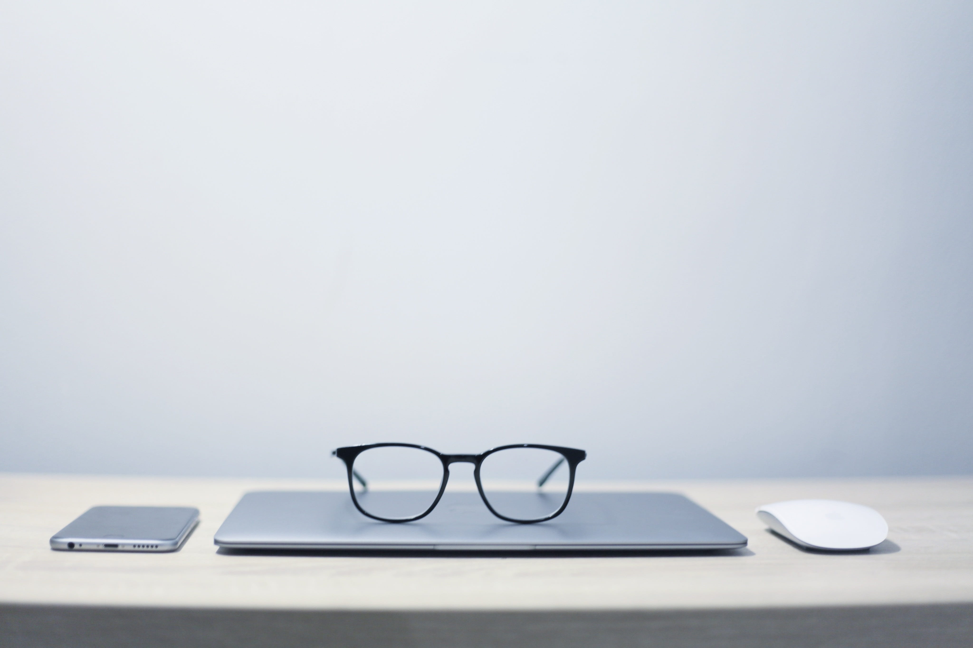 simplicity, minimalism, personal accessory, black, desk, notebook, indoors, framed, phone, laptop, eyewear, glasses, no people, still life, grey, studio shot, HD Wallpaper