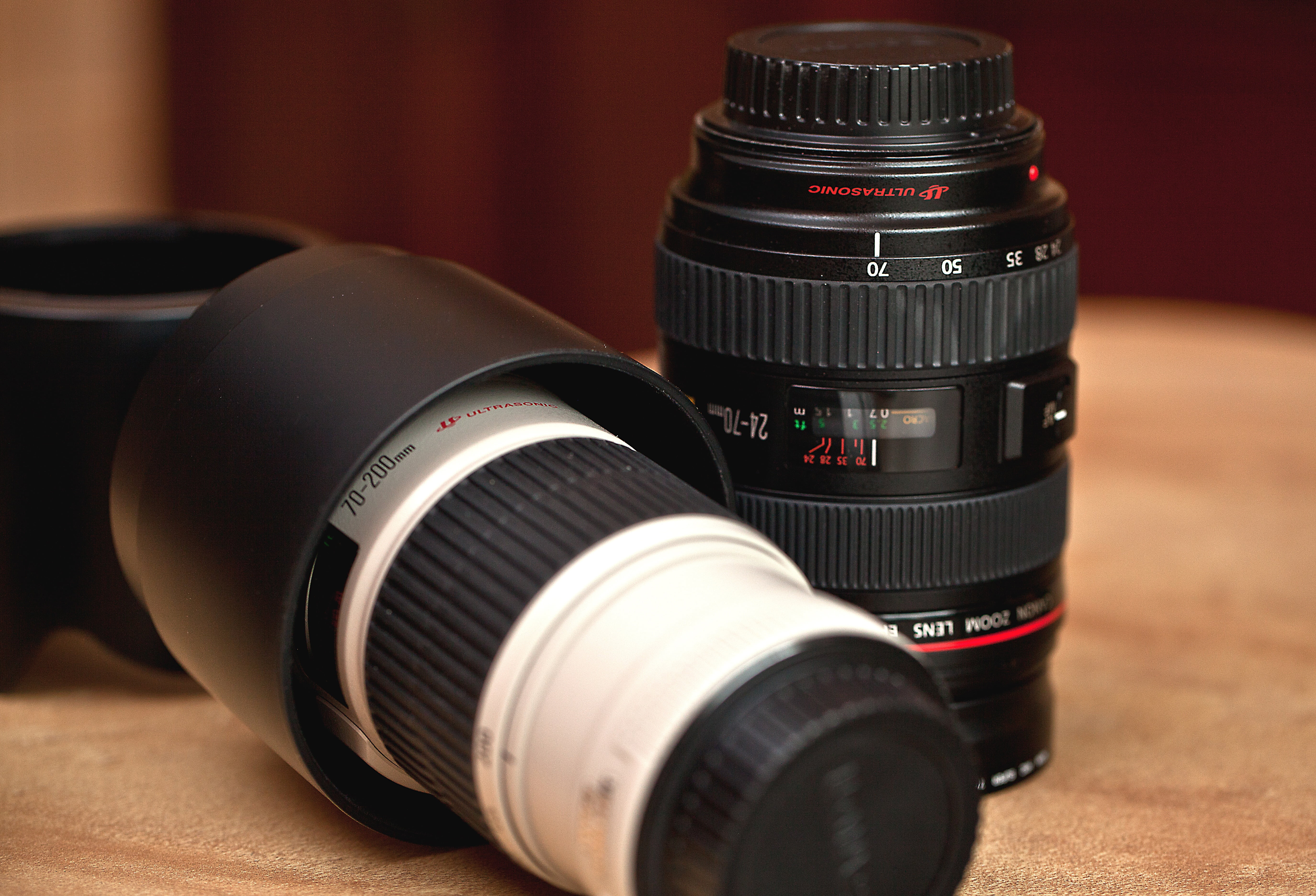 table, indoors, lens średnioogniskowy, equipment brand, photographic equipment, modern, still life, 5K, close-up, technology, digital camera, lens - optical instrument, HD Wallpaper