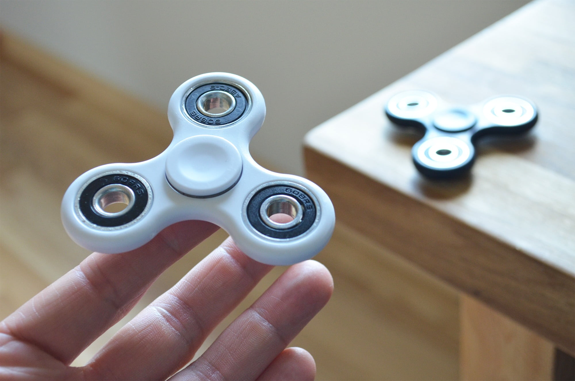 close-up, adult, high angle view, spinner, people, choice, technology, toy, one man only, hand, steel, human hand, 1080P, bearing, healthcare and medicine, HD Wallpaper