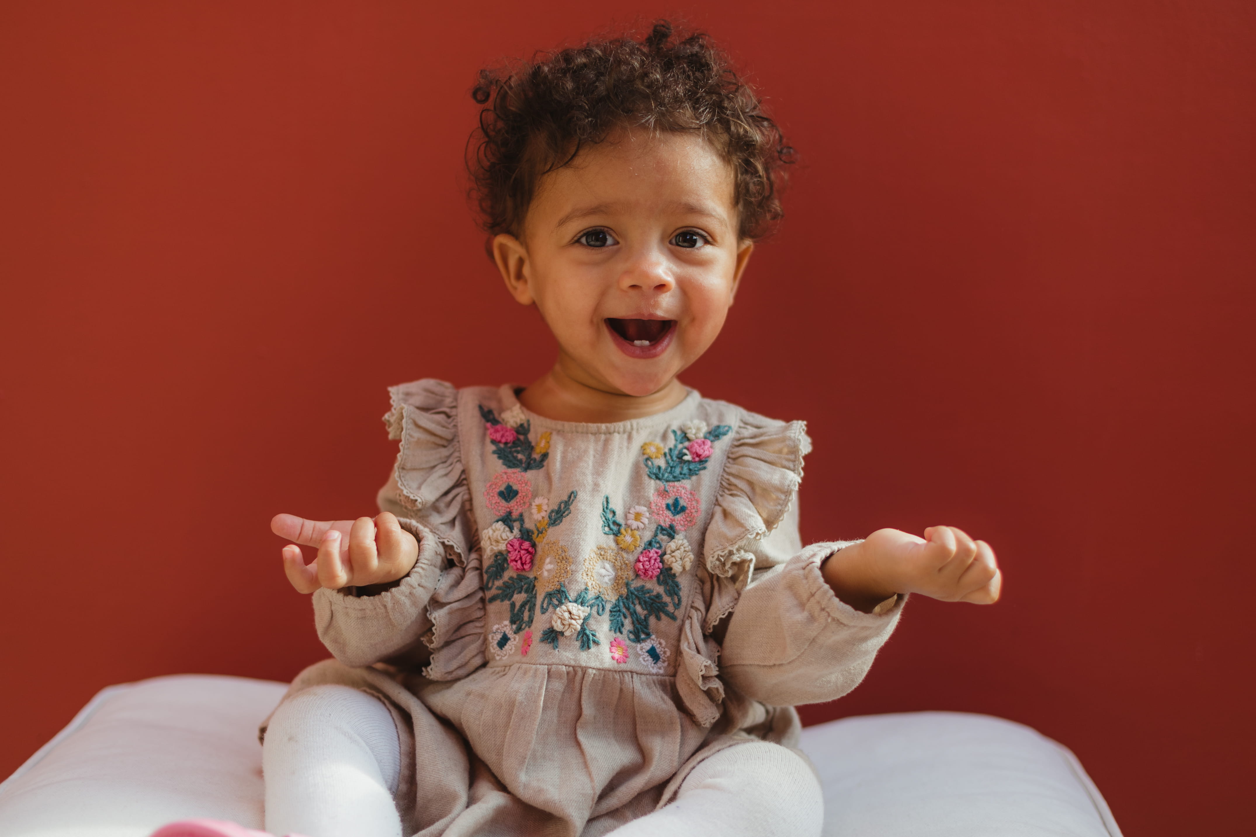 three quarter length, looking at camera, red, pillow, child, cushion, curly hair, baby, human, baby model, innocence, african girl, orange, human body part, HD Wallpaper