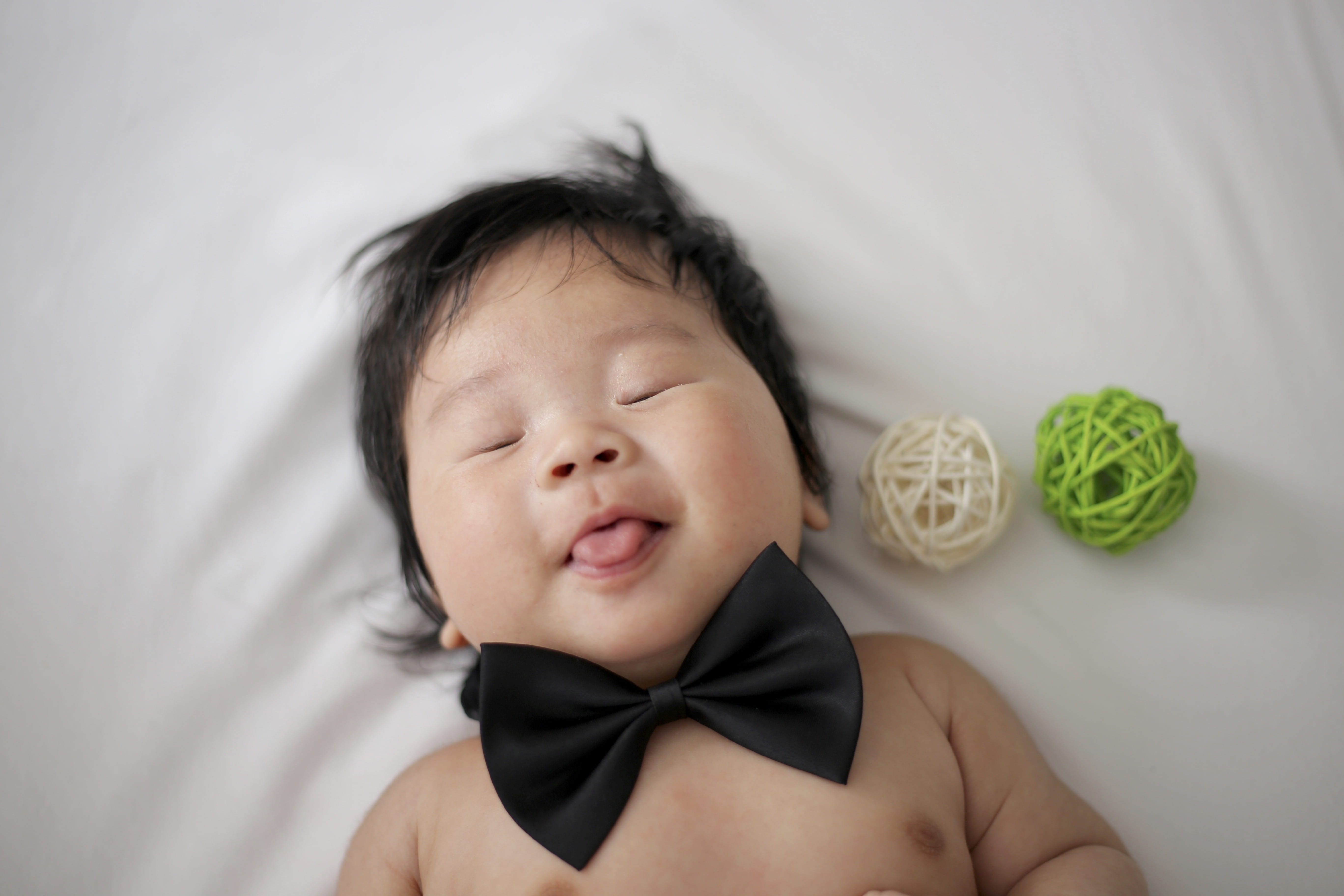 young, human, furniture, mouth, newborn, face, tie, person, accessories, childhood, pillow, sleeping, child, head, accessory, baby, eyes closed, front view, HD Wallpaper
