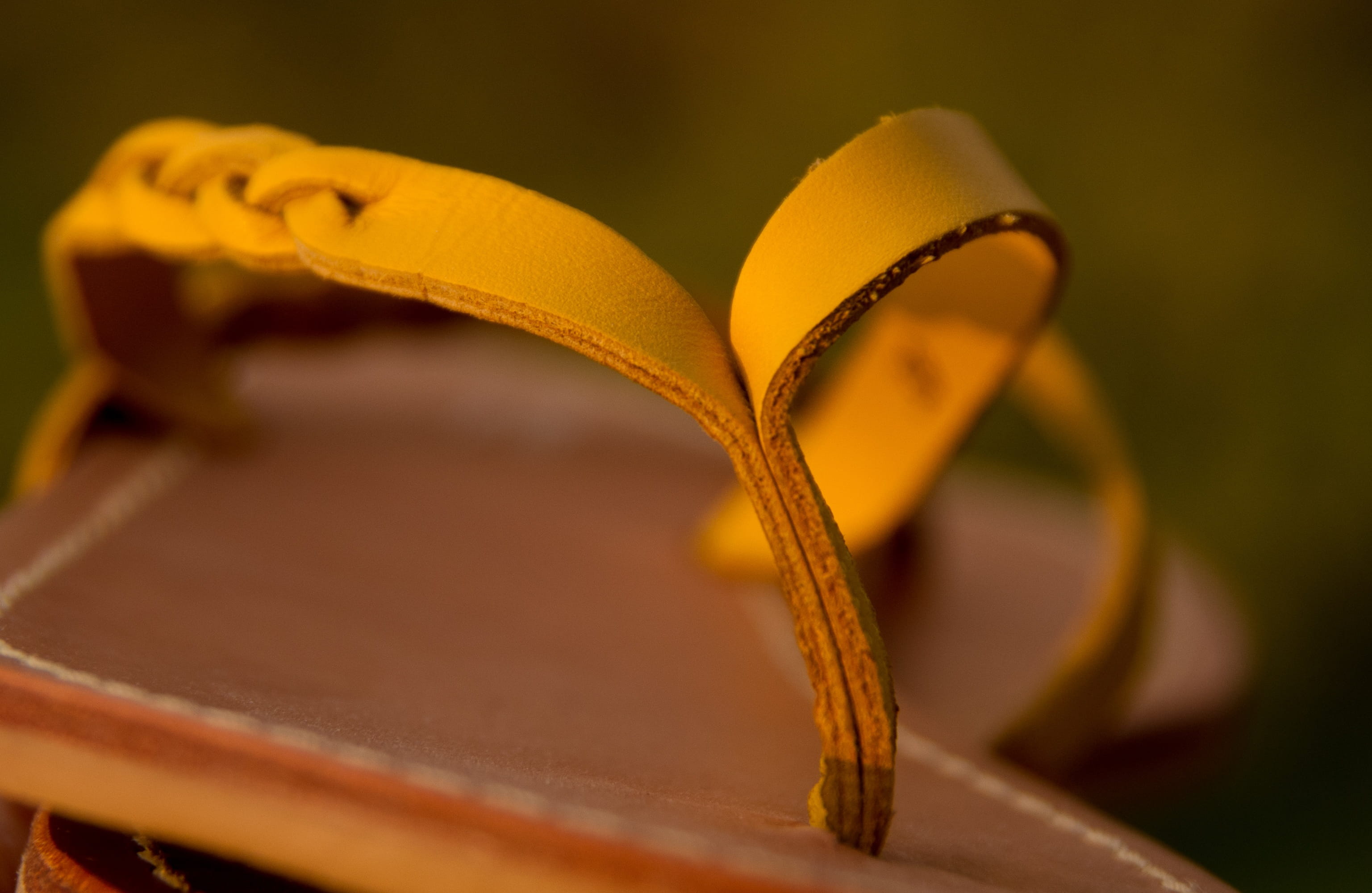 focus on foreground, indoors, Thongs, old, sandal, no People, brown, selective focus, focus, close-up, wood - material, book, colored background, Sandals, HD Wallpaper