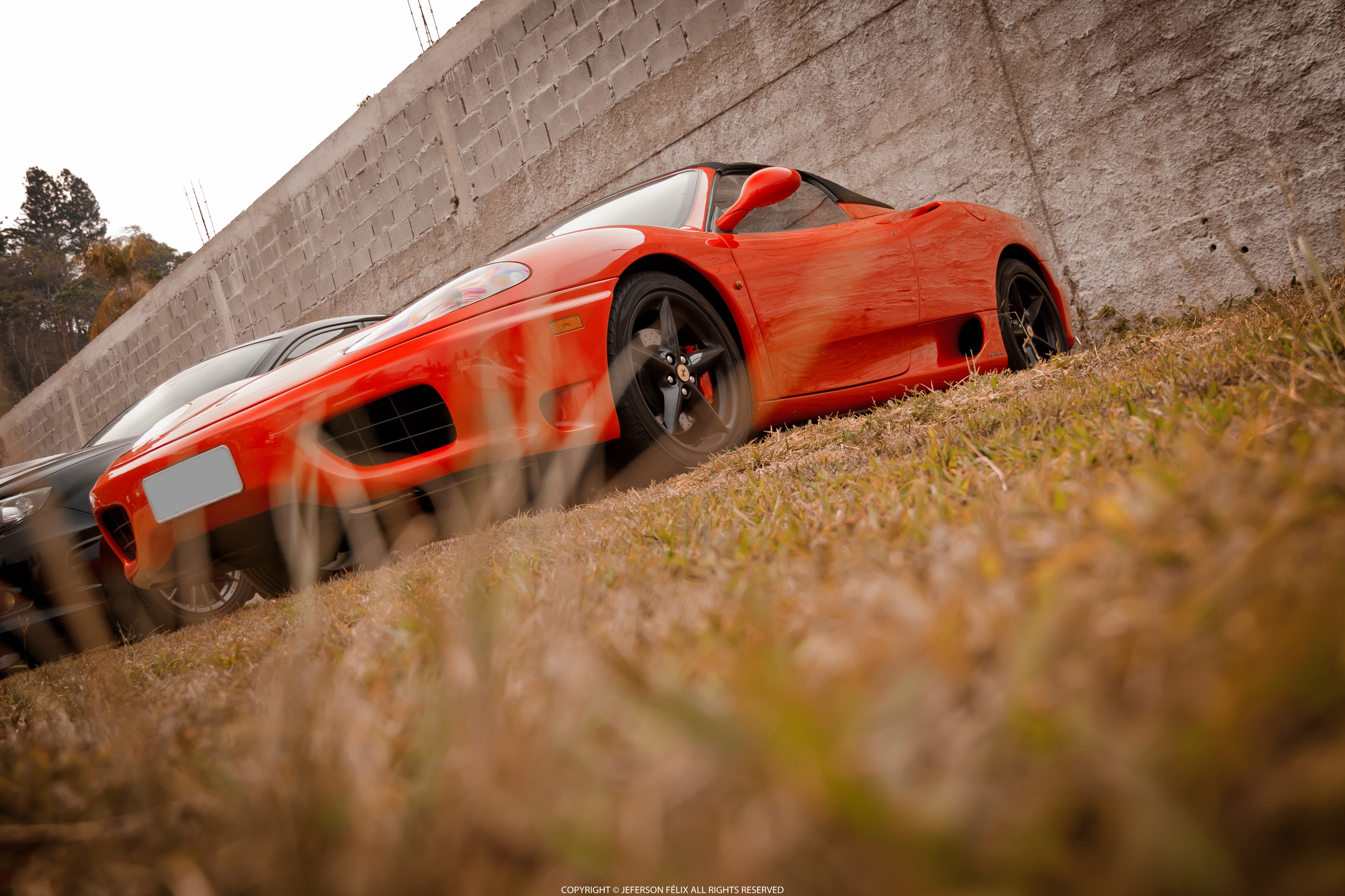 mode of transportation, red, selective focus, motor vehicle, tire, non-urban scene, land vehicle, day, land, architecture, car, outdoors, no people, Ferrari, HD Wallpaper