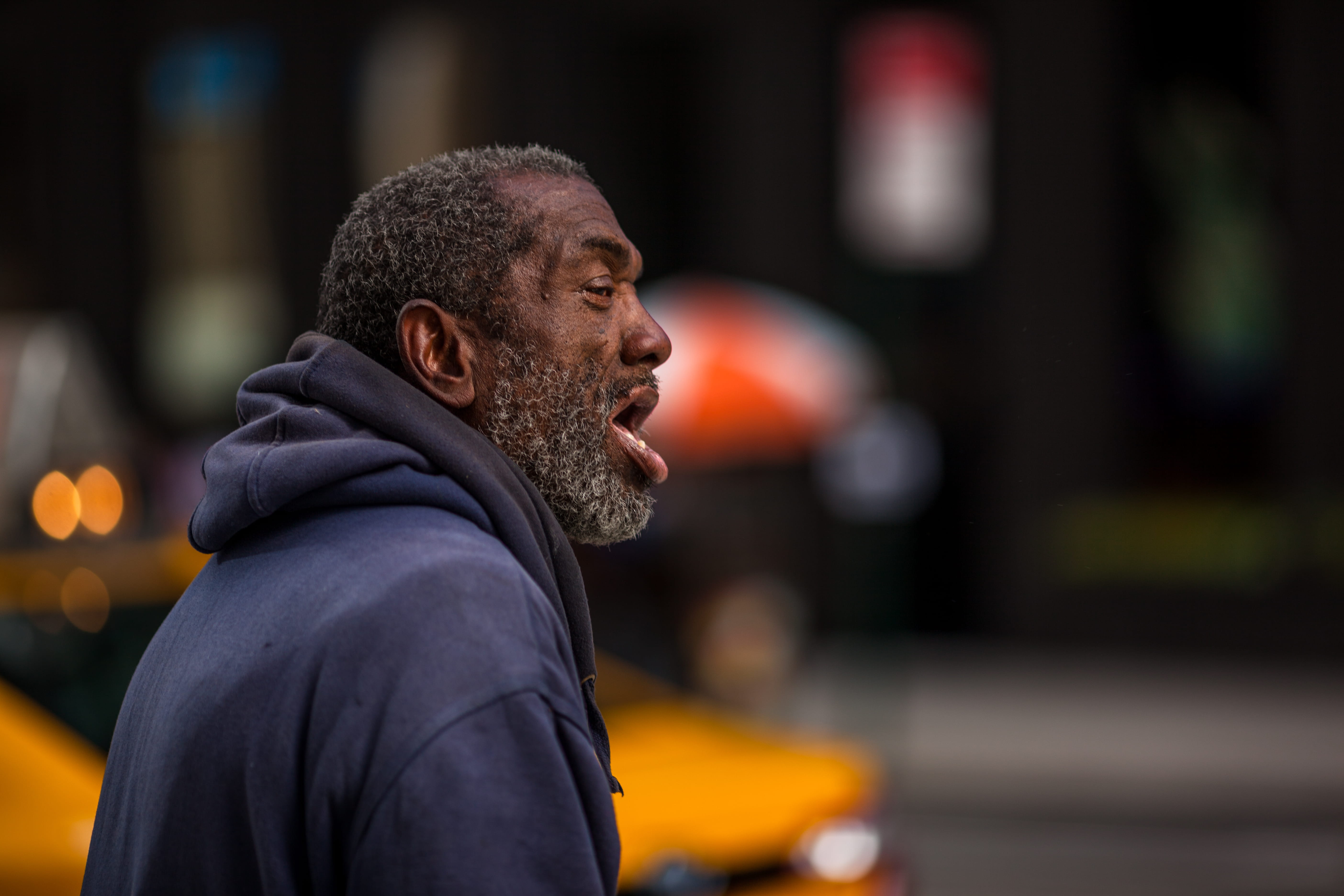 5K, shouting, street, focus on foreground, standing, looking, contemplation, side view, architecture, profile view, united states, man, city, one person, HD Wallpaper