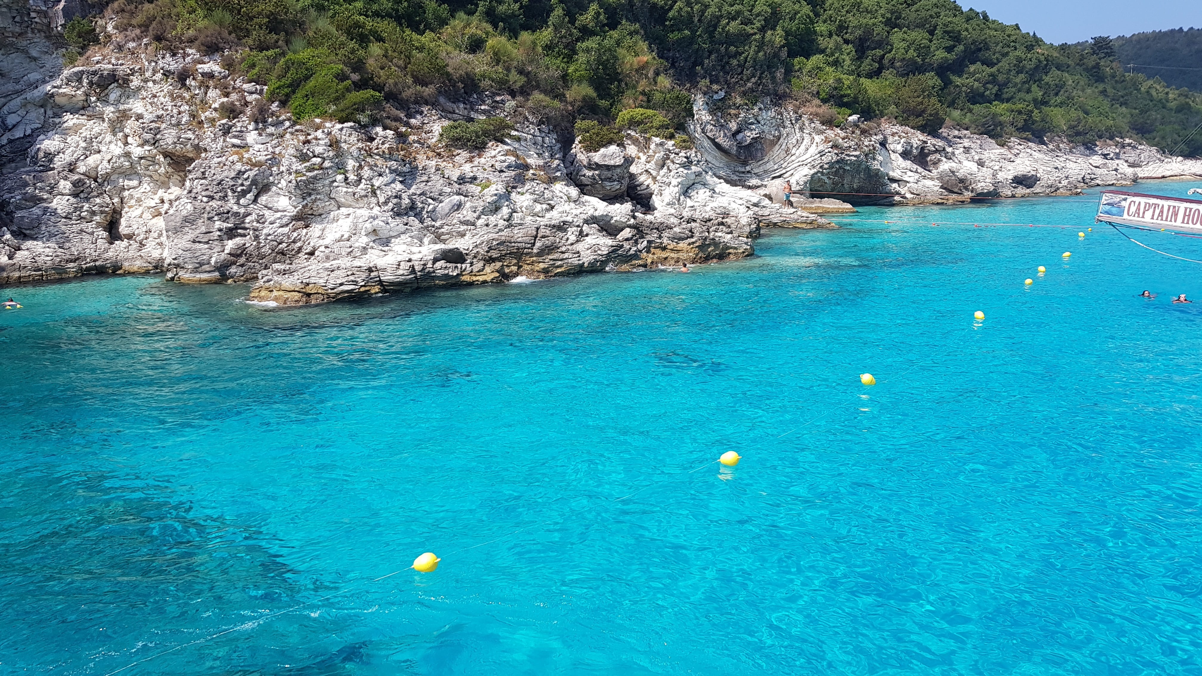 land, rock, outdoors, sailboat, travel destinations, solid, water, turquoise colored, nature, rock formation, paxos, holiday, day, scenics - nature, trip, HD Wallpaper