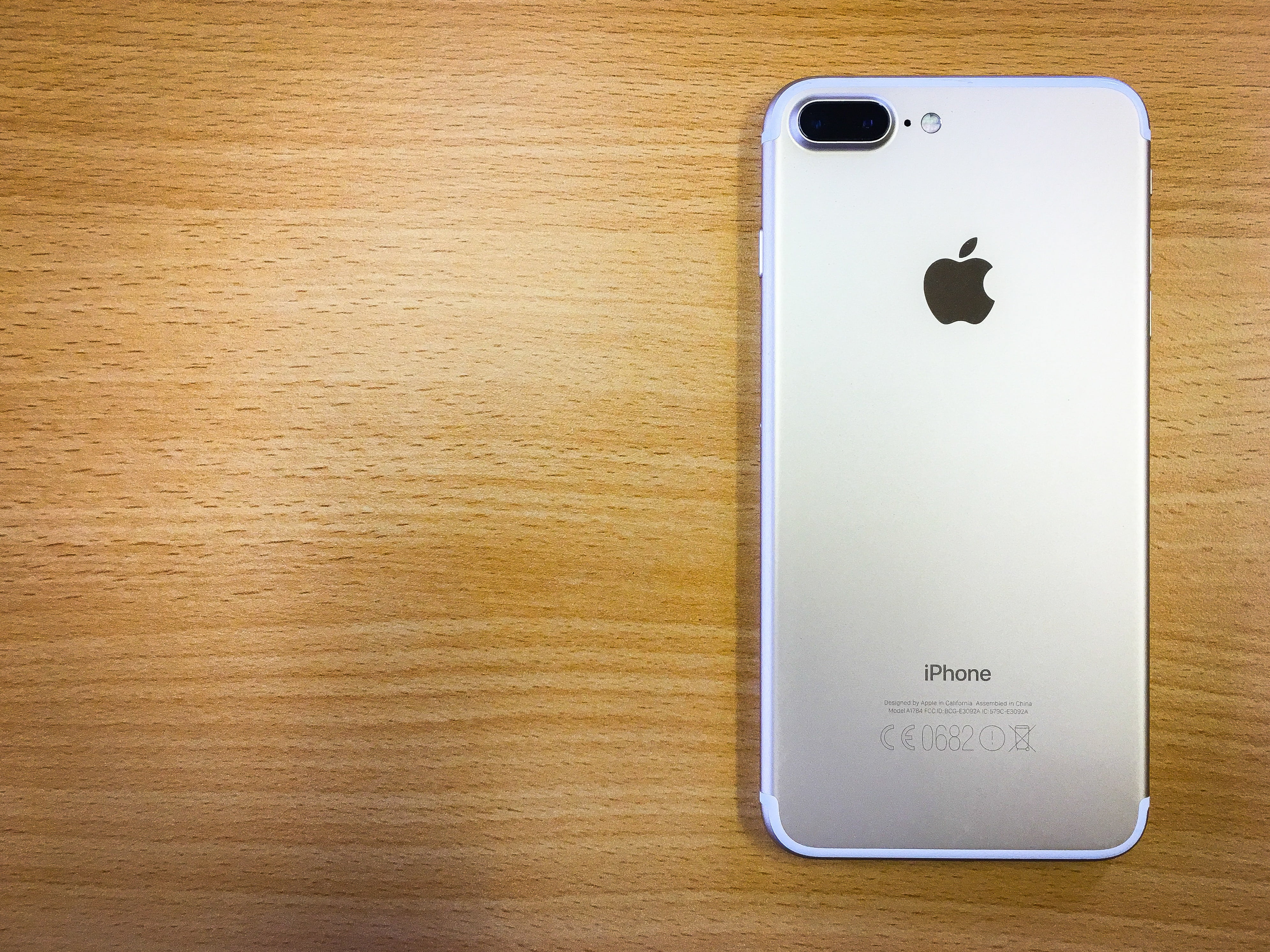 sign, iphone, brown, silver, surface, copy space, iphone 7 plus, metal, wireless technology, table, directly above, plus, connection, text, technology, HD Wallpaper