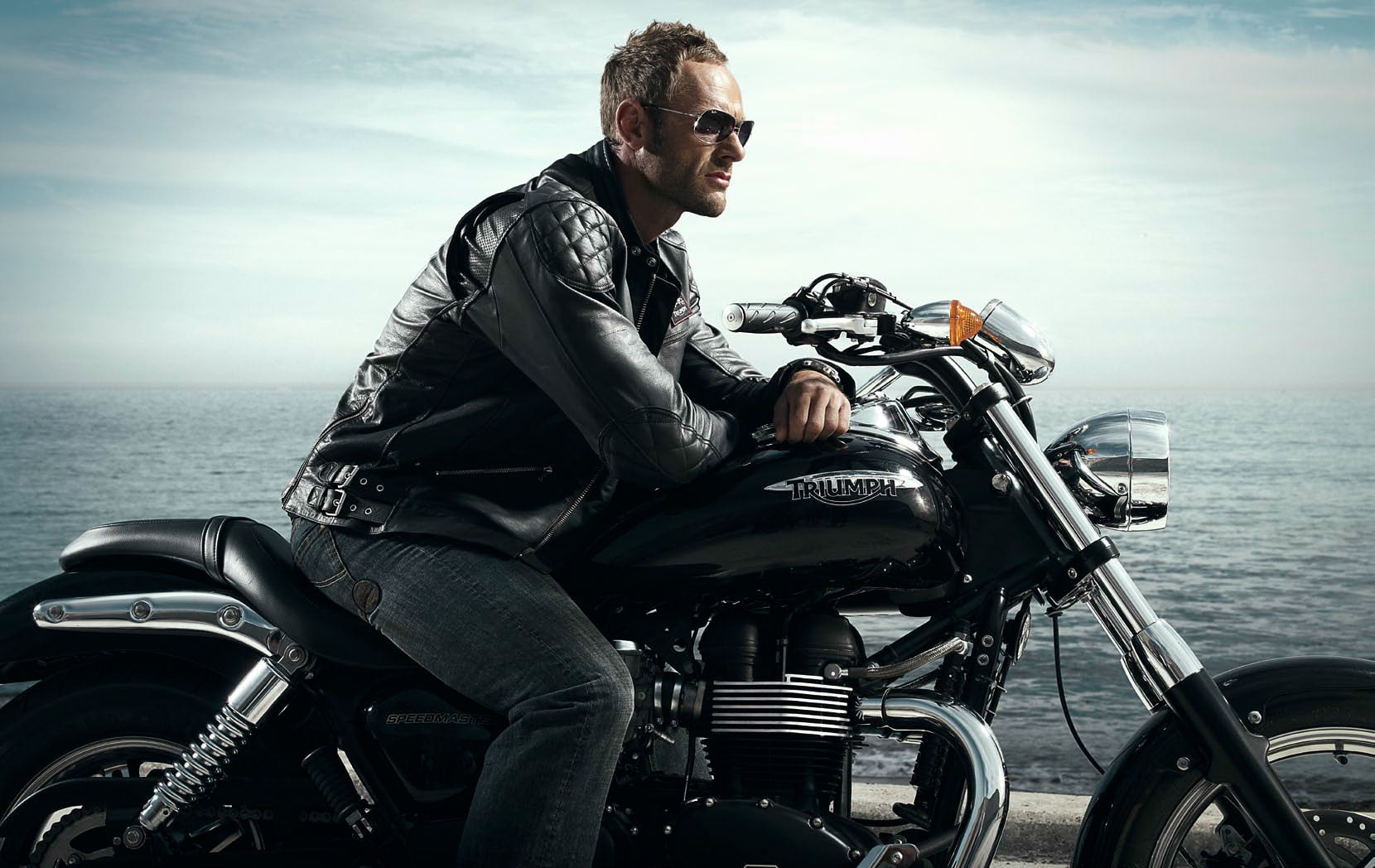 speedmaster, young men, young adult, 720P, sitting, casual clothing, real people, biker, outdoors, one person, fashion, three quarter length, mode of transportation, HD Wallpaper