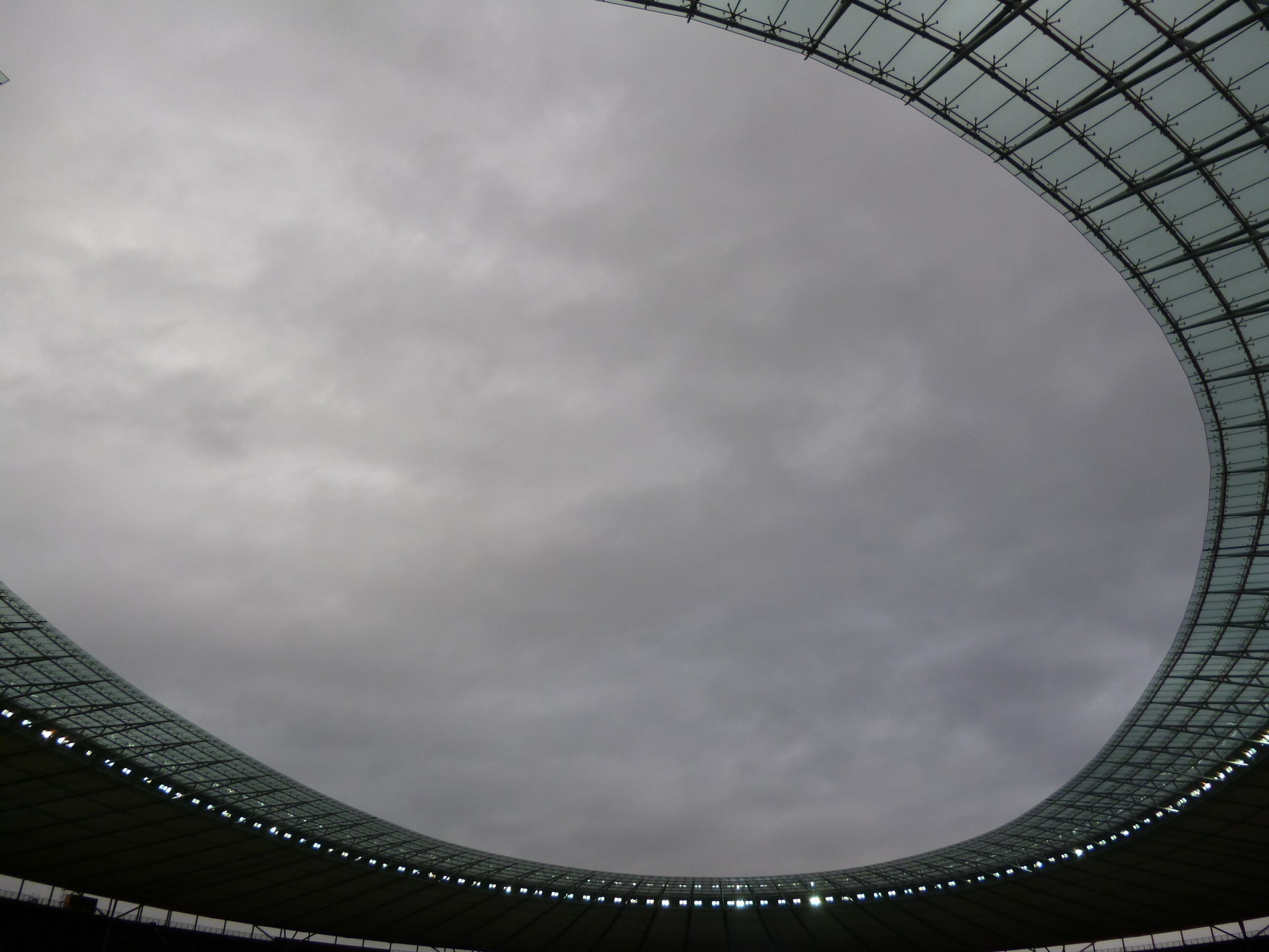 built structure, architecture, no people, olympic stadium, 2K, city, low angle view, roof, design, overcast, building, travel destinations, nature, cloud - sky, HD Wallpaper