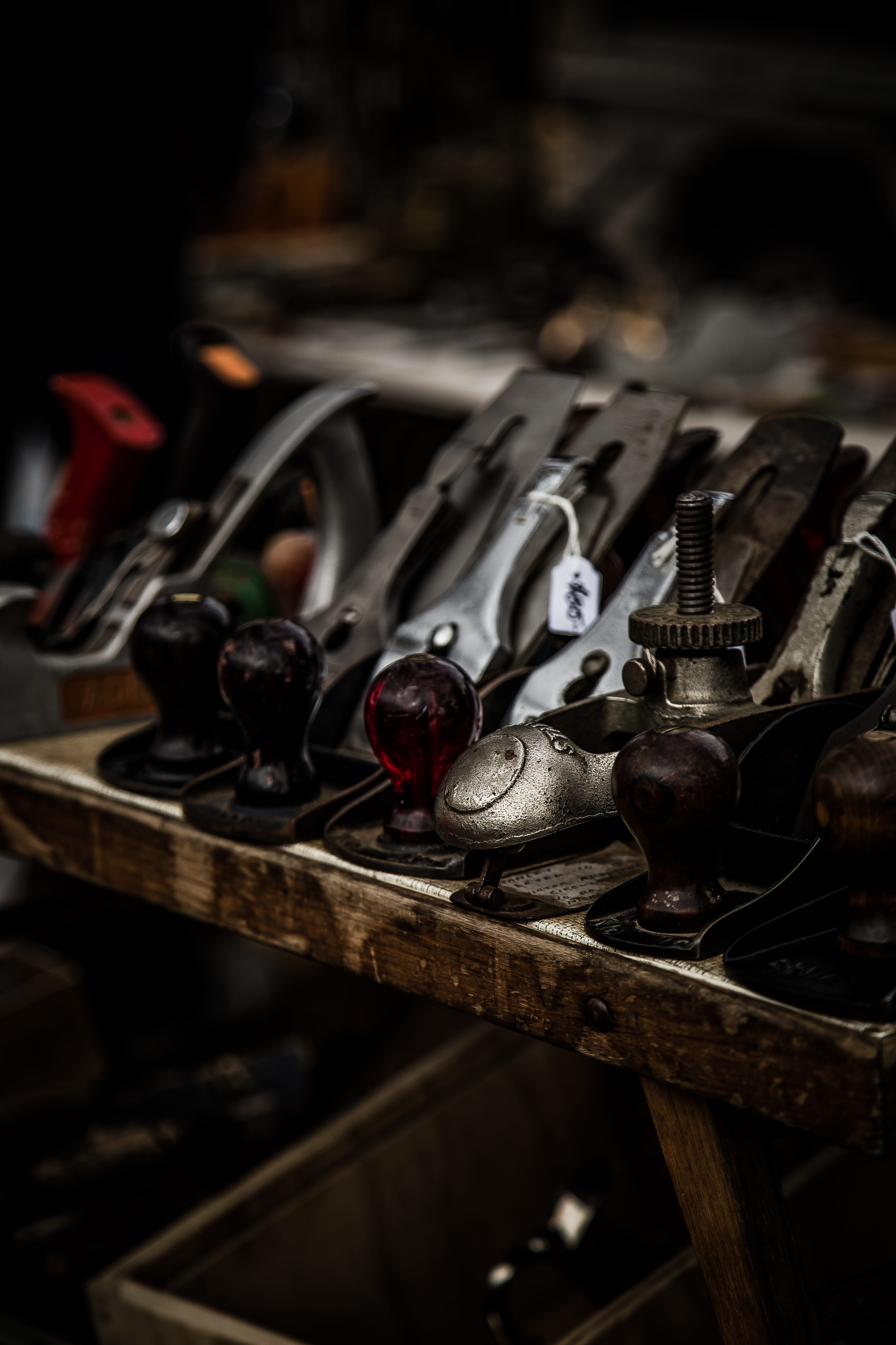 workshop, label, price tag, high angle view, variation, container, wood, metal, repairing, placed, still life, board, hand tool, pile, focus on foreground, Phone HD Wallpaper
