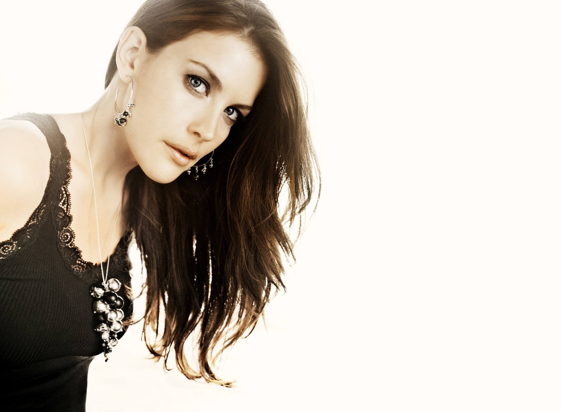 fashion, Liv Tyler, women, 1080P, white background, top, adult, lifestyles, long hair, beauty, floral, one person, black, looking at camera, studio shot, HD Wallpaper