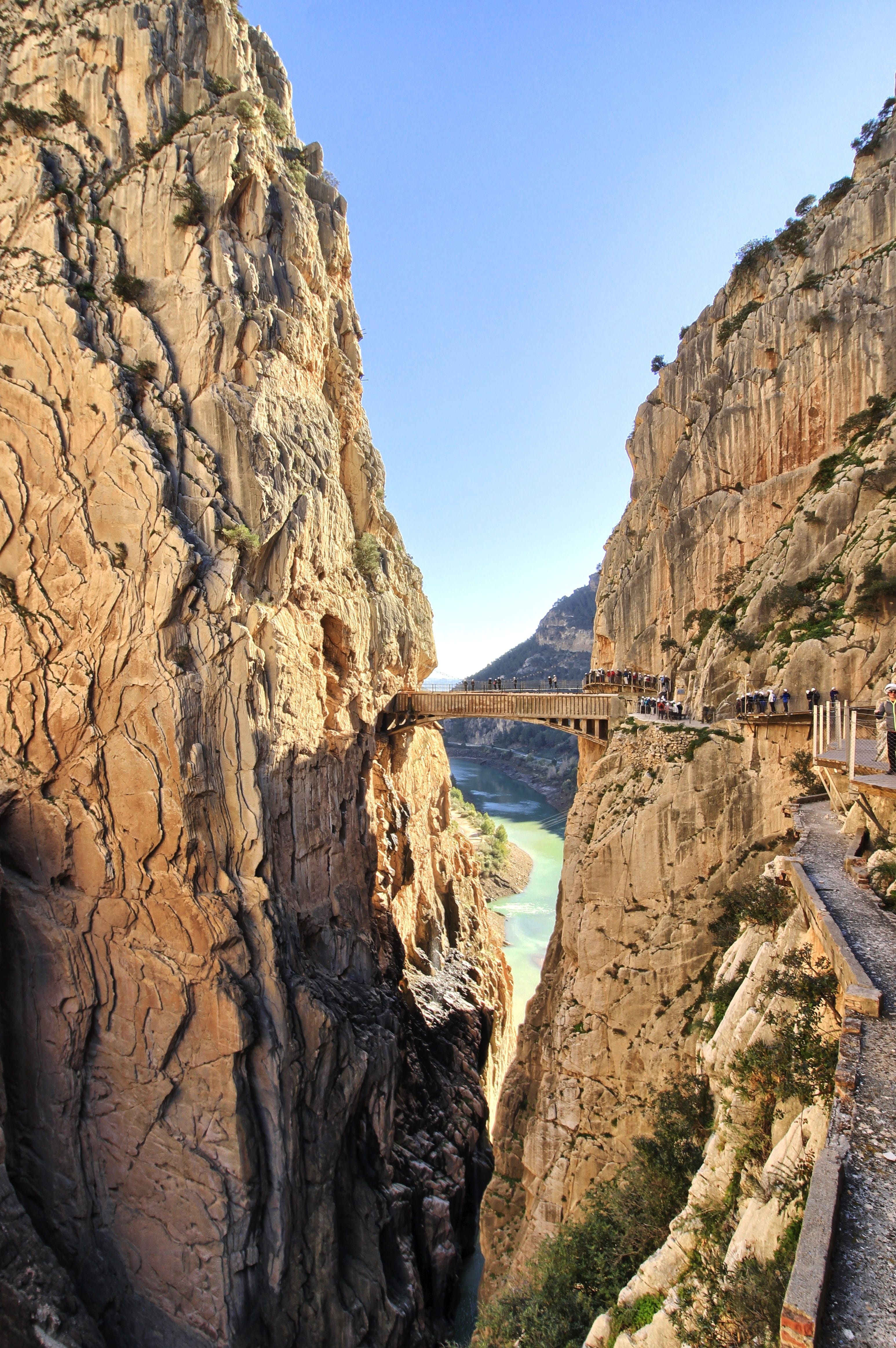 rock, suspension bridge, tranquility, 4K, rock formation, mountain, nature, tranquil scene, beauty in nature, cliff, caminito del rey, no people, eroded, Phone HD Wallpaper