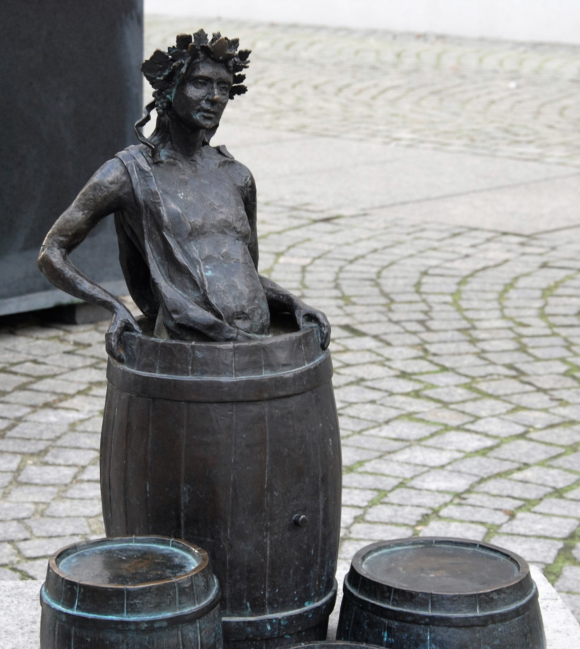 poland, drinking, no people, architecture, male likeness, brass, day, wine, human representation, bronze - alloy, old, focus on foreground, zielona gora, Phone HD Wallpaper