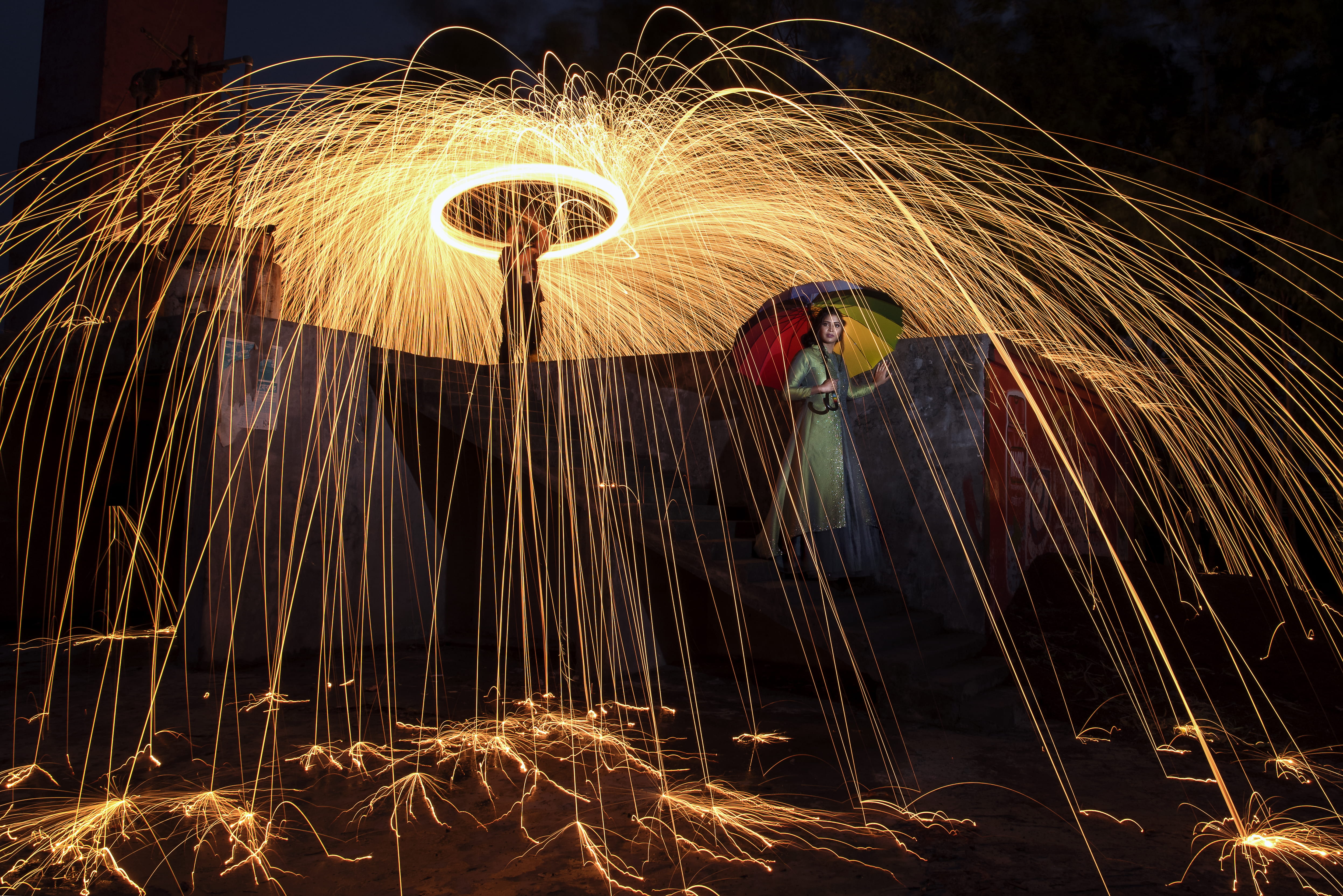 tamron, beside, light trail, sparks, speed, men, umbrella, illuminated, celebration, lines, orange, long exposure, light, glowing, wire wool, person, one person, HD Wallpaper
