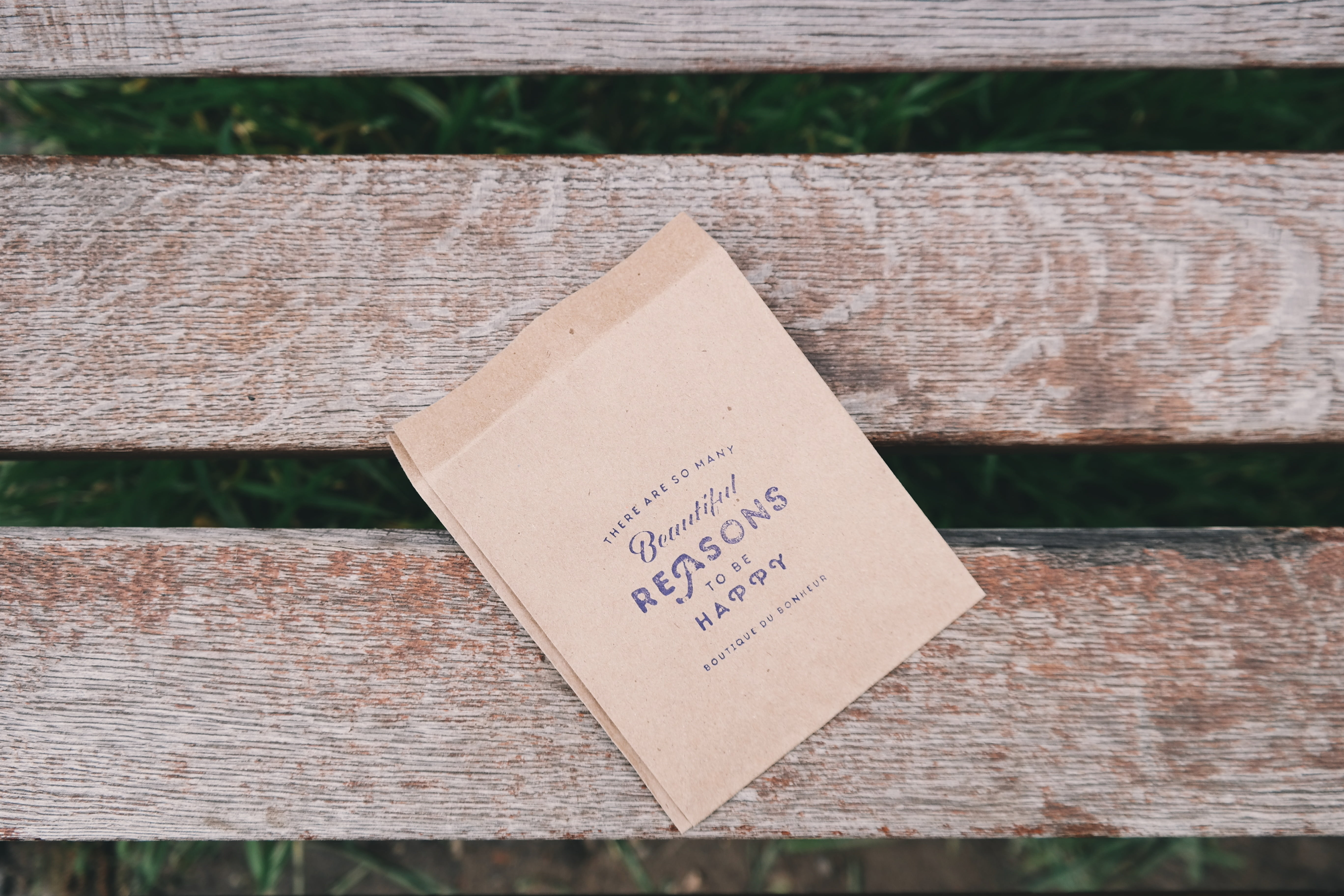 park, focus on foreground, bench, happy, reasons, bag, positive emotion, high angle view, text, message, wood, no people, plank, brown, paper, information, HD Wallpaper