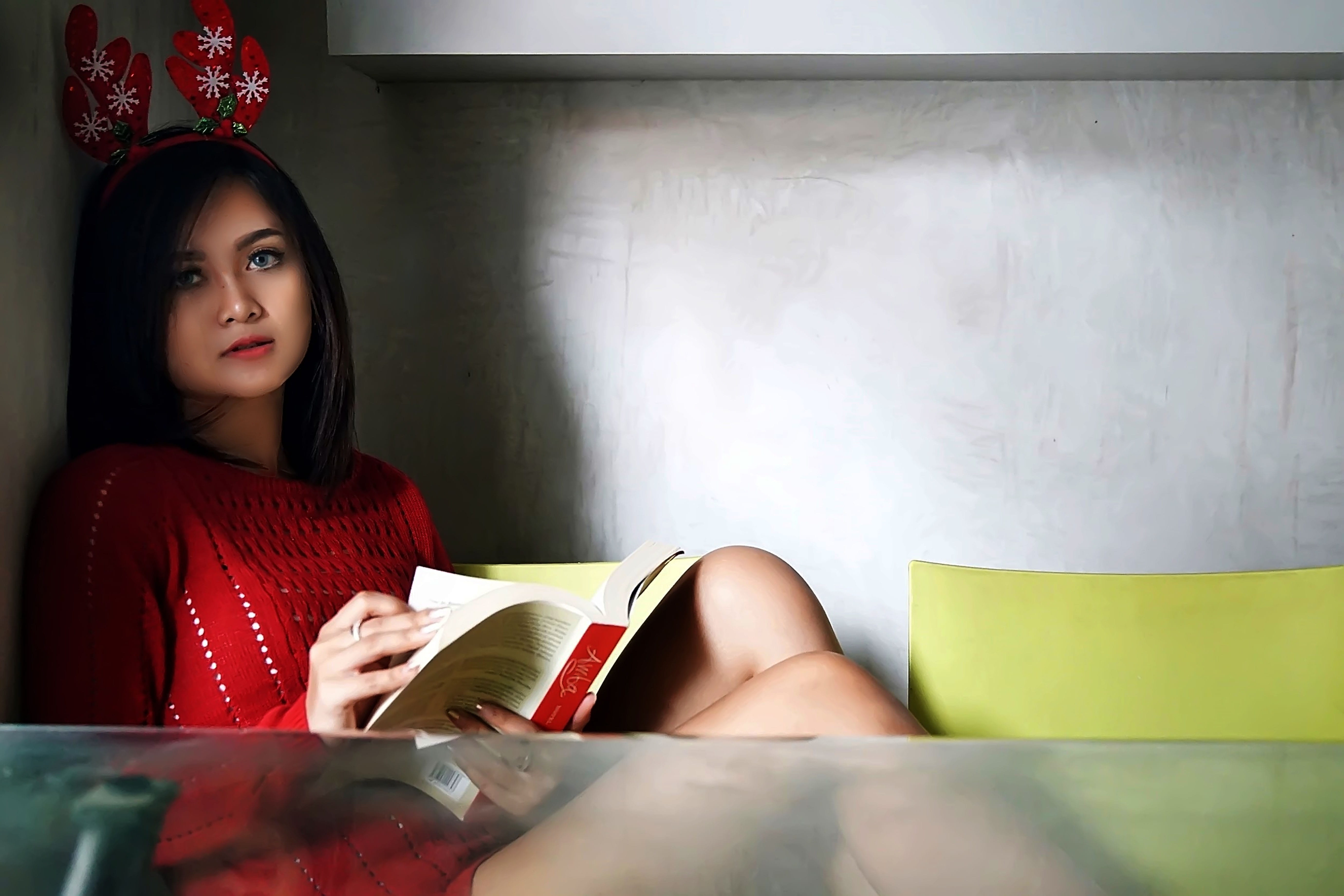 indoors, model, young women, hairstyle, magazine, sitting, headwear, one person, female, photo, front view, red, facial expression, red dress, reading, HD Wallpaper