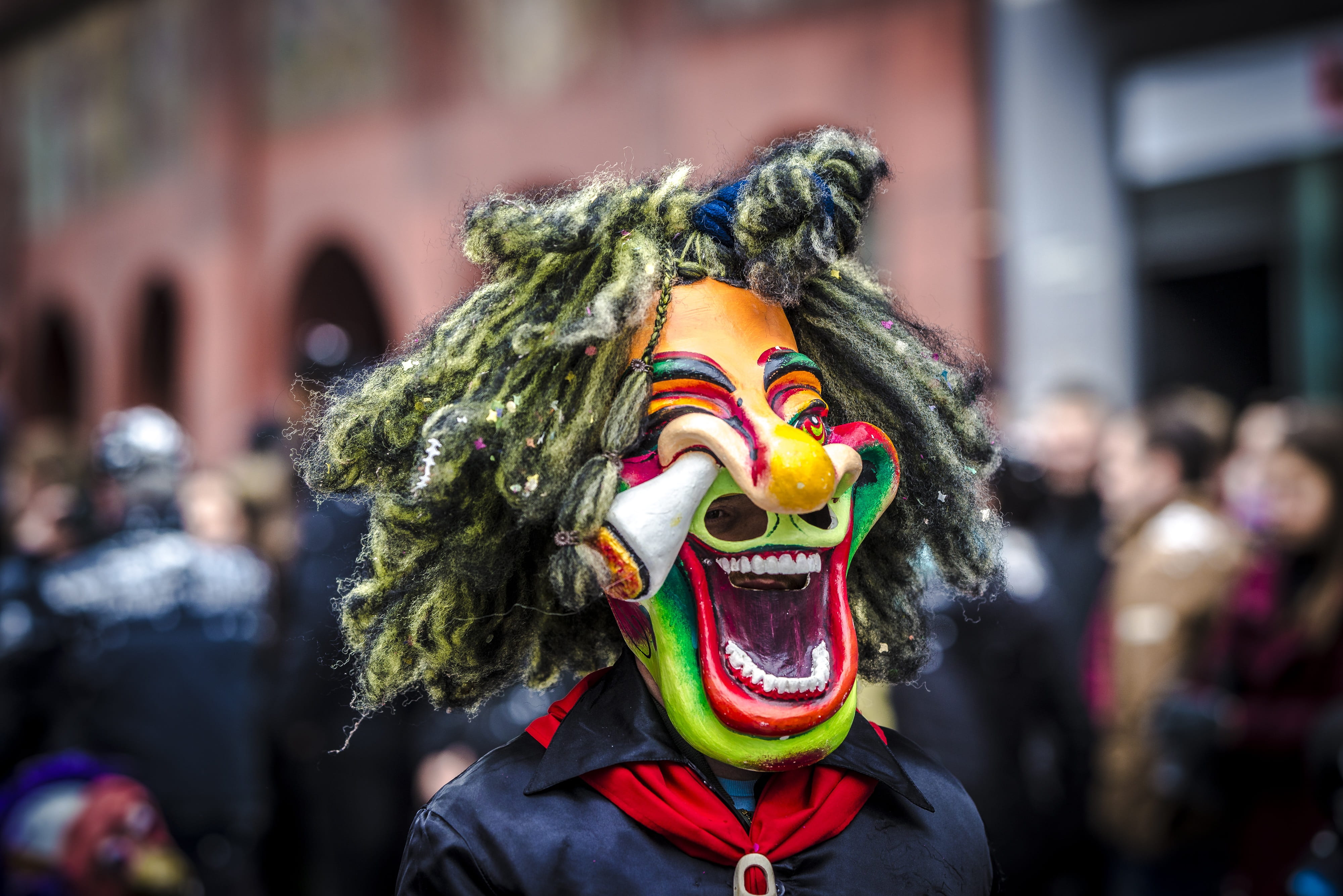 focus on foreground, one person, parade, carnival, event, city, human, 4K, men, obscured face, larva, real people, arts culture and entertainment, mouth open, HD Wallpaper