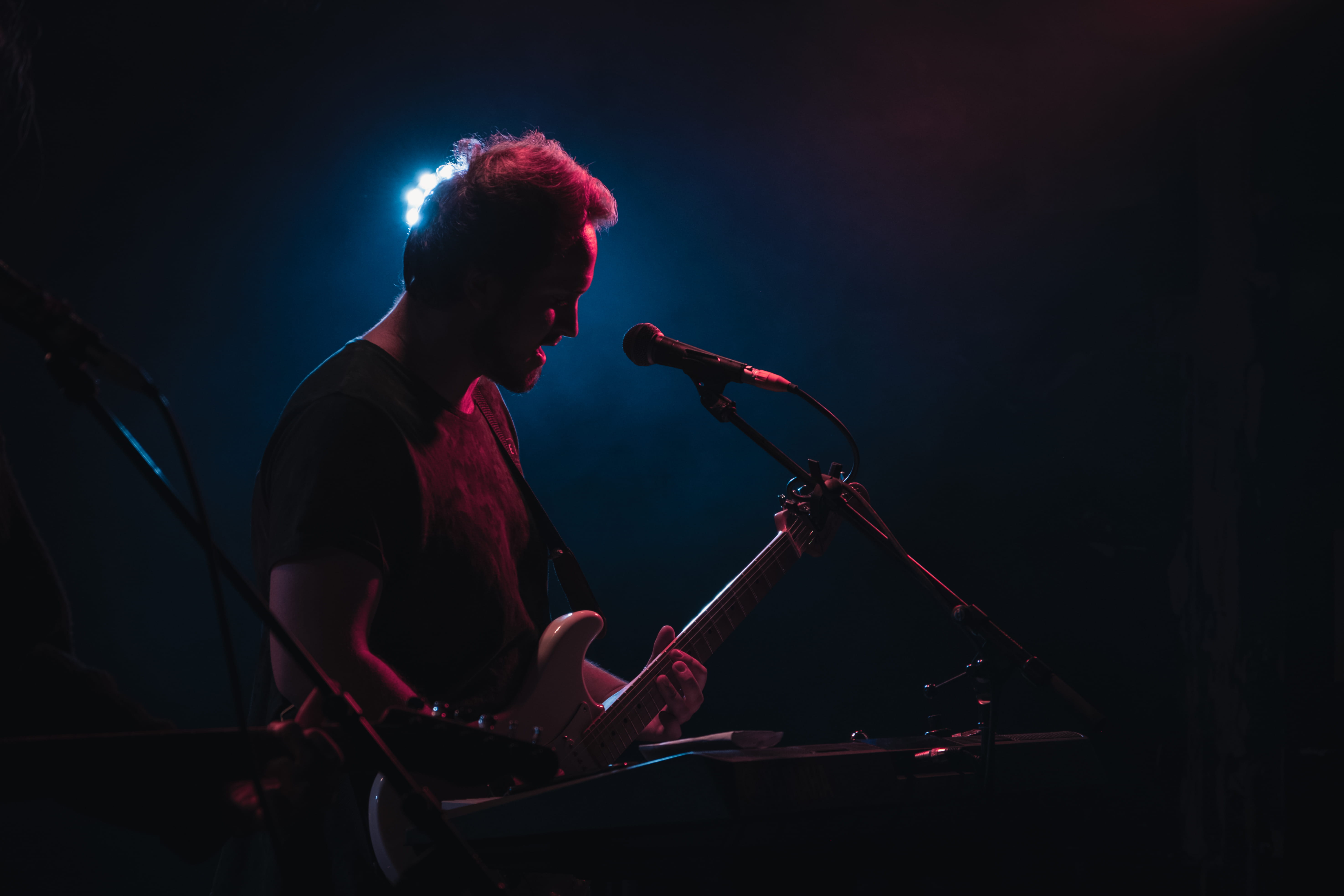 guitar, the gasometer hotel, illuminated, performing, fool child, dark, mid adult, crowd, black background, musical instrument, electric, stage - performance space, HD Wallpaper
