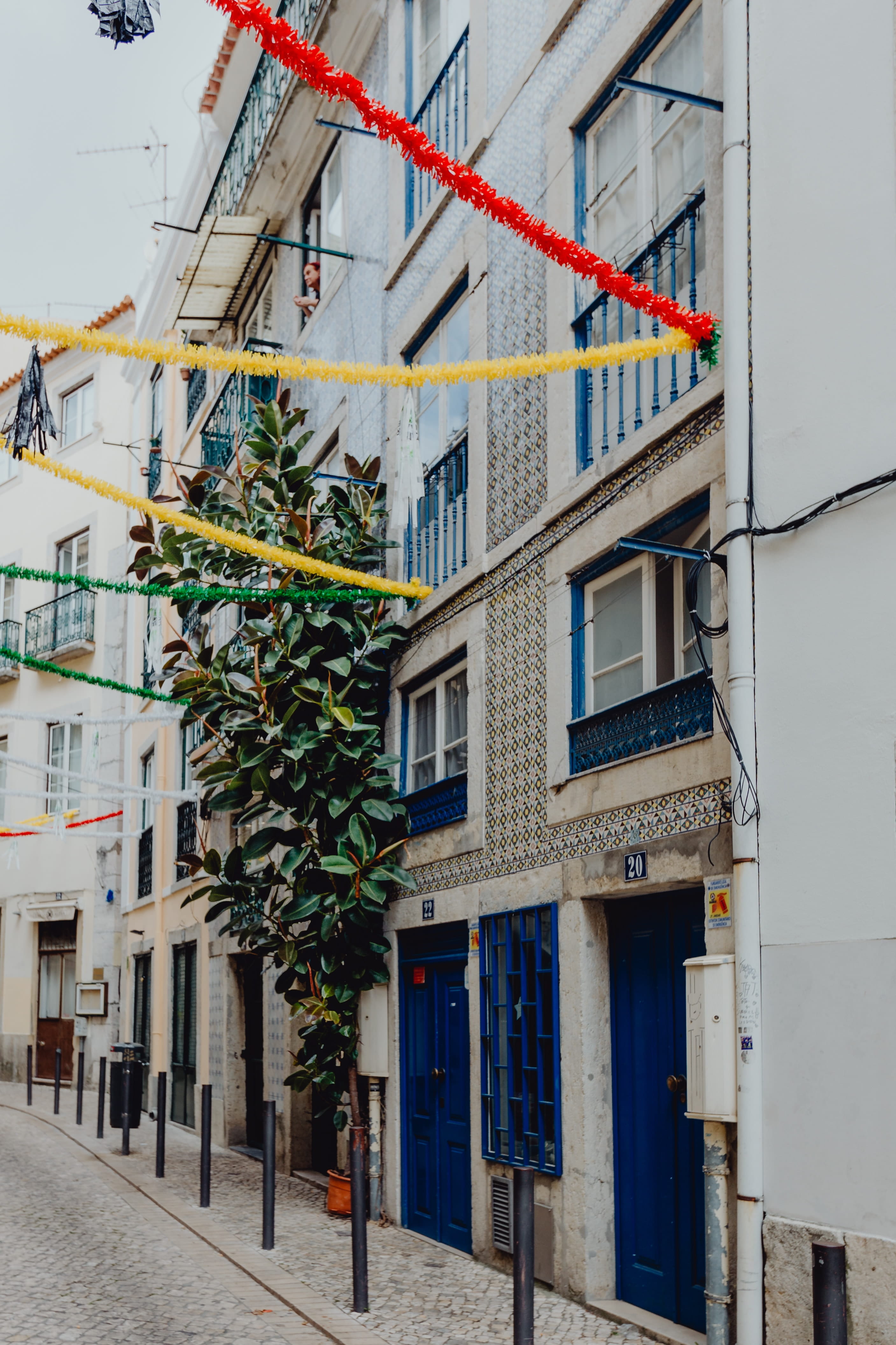 incidental people, one person, travel, anthony, portugal, happy, decorated, outdoors, lisbon, house, alfama, garland, real people, building, footpath, street, Phone HD Wallpaper