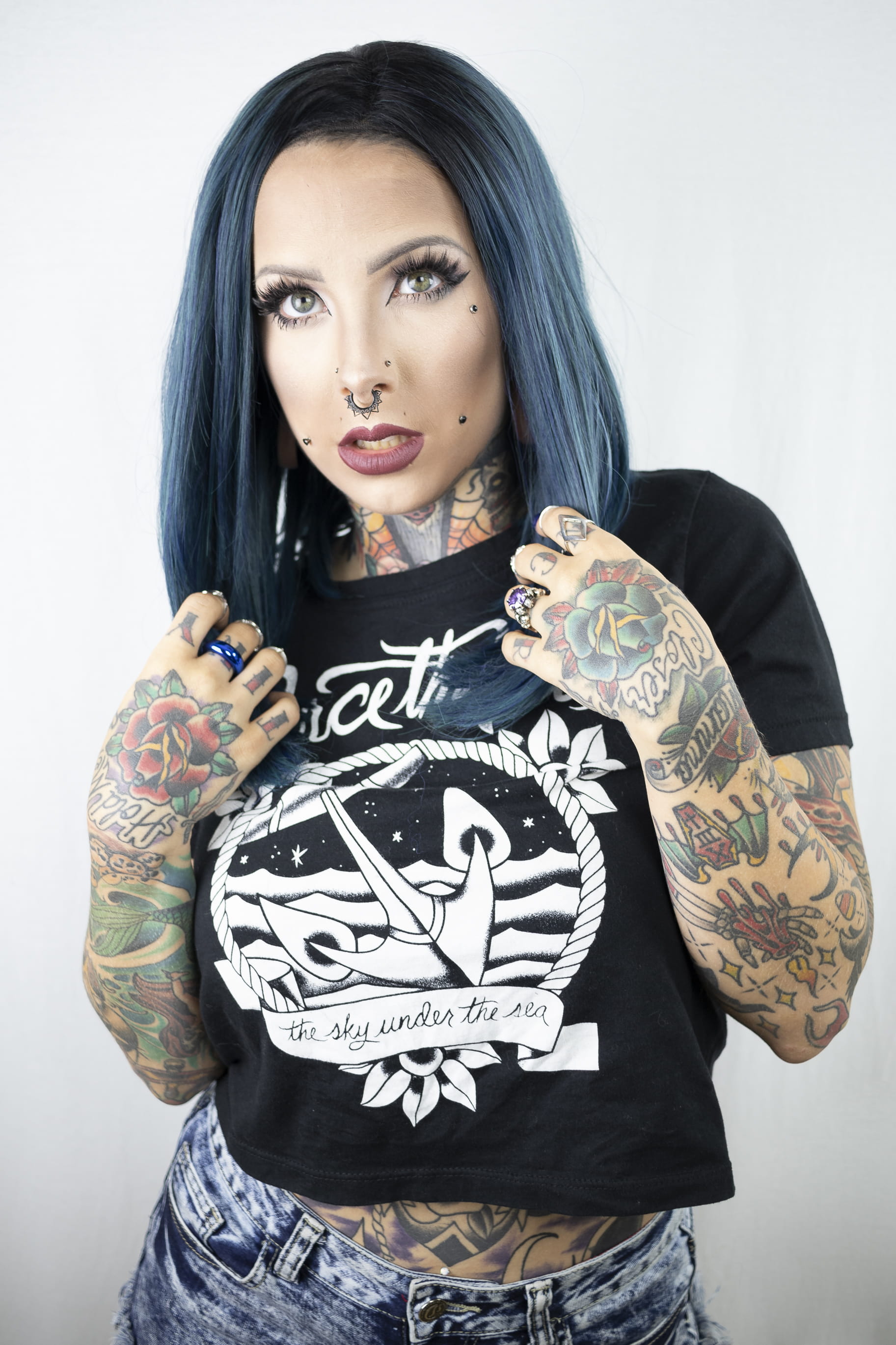 beautiful, tattoos, hairstyle, female, casual clothing, waist up, shirt, wearing, fashion, nose ring, model, looking at camera, blue, style, photoshoot, Phone HD Wallpaper