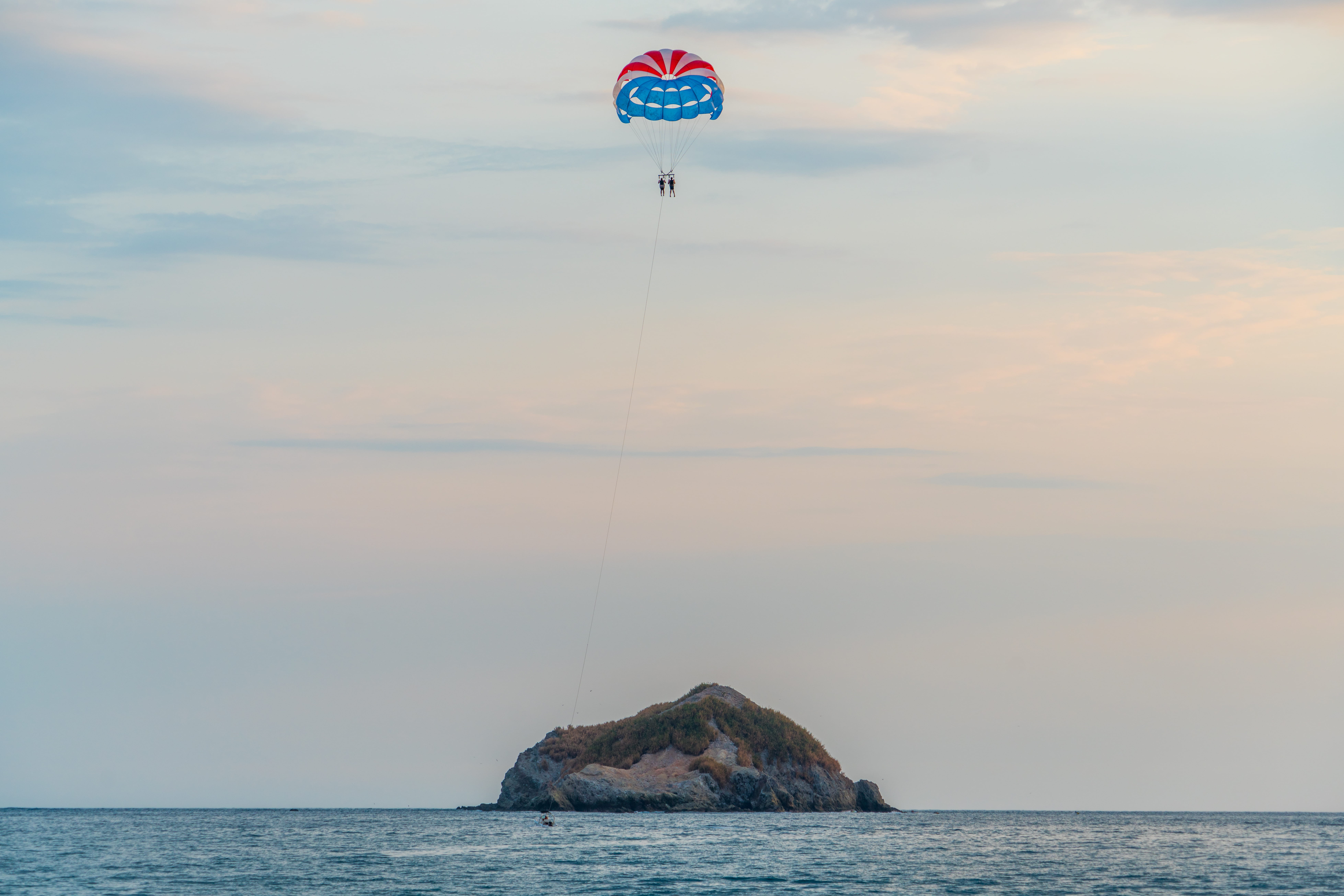 green island, islet, action, rock, kiteboarding, vacations, water, sports And Fitness, idyllic, leisure Activity, cloud - sky, blue, recreational Pursuit, HD Wallpaper